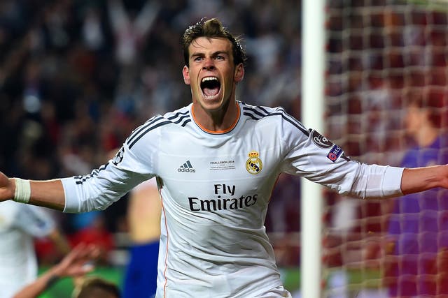 Gareth Bale celebrates scoring the winning goal in the Champions League final