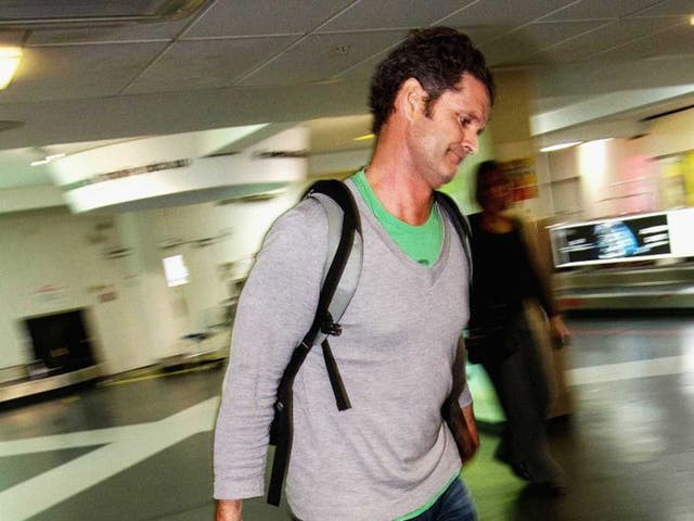 Former New Zealand cricketer Chris Cairns arrives at Auckland Airport 