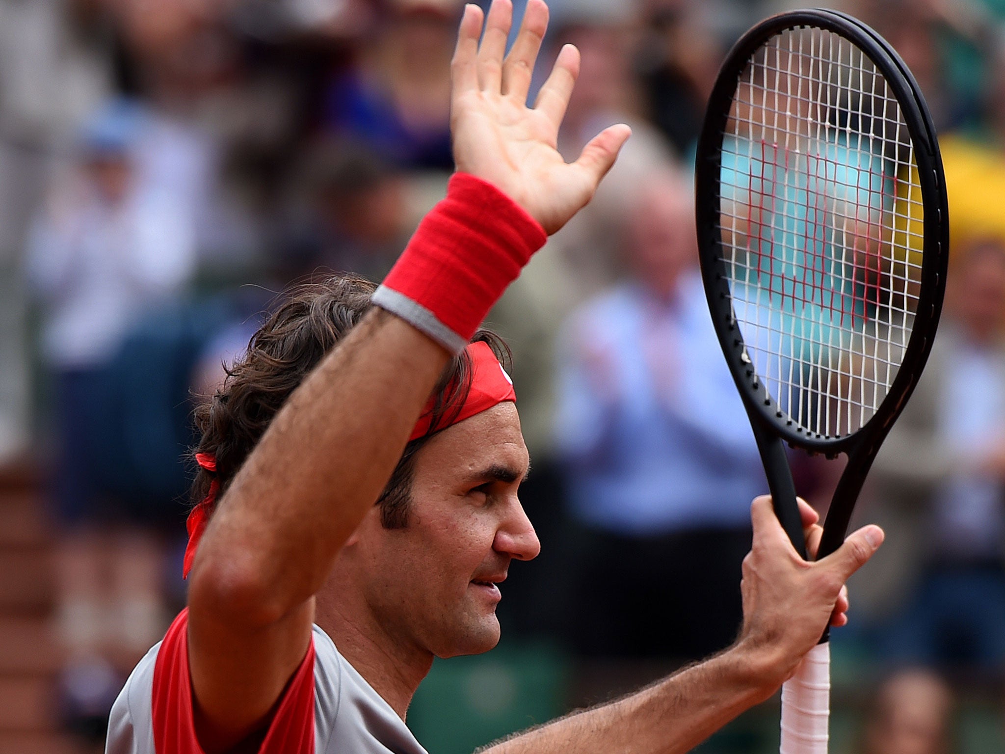 Roger Federer of Switzerland celebrates victory over Lukas Lacko
