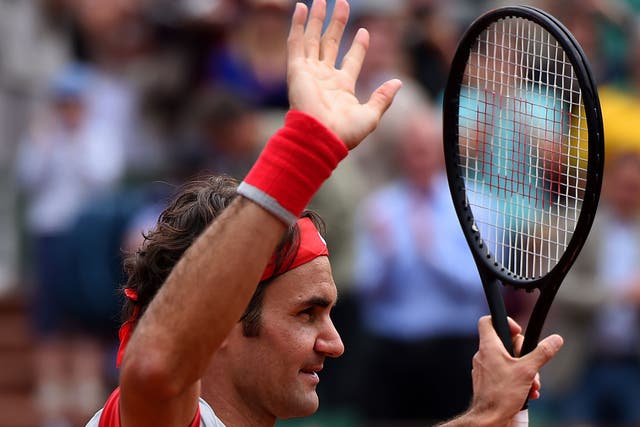 Roger Federer of Switzerland celebrates victory over Lukas Lacko 
