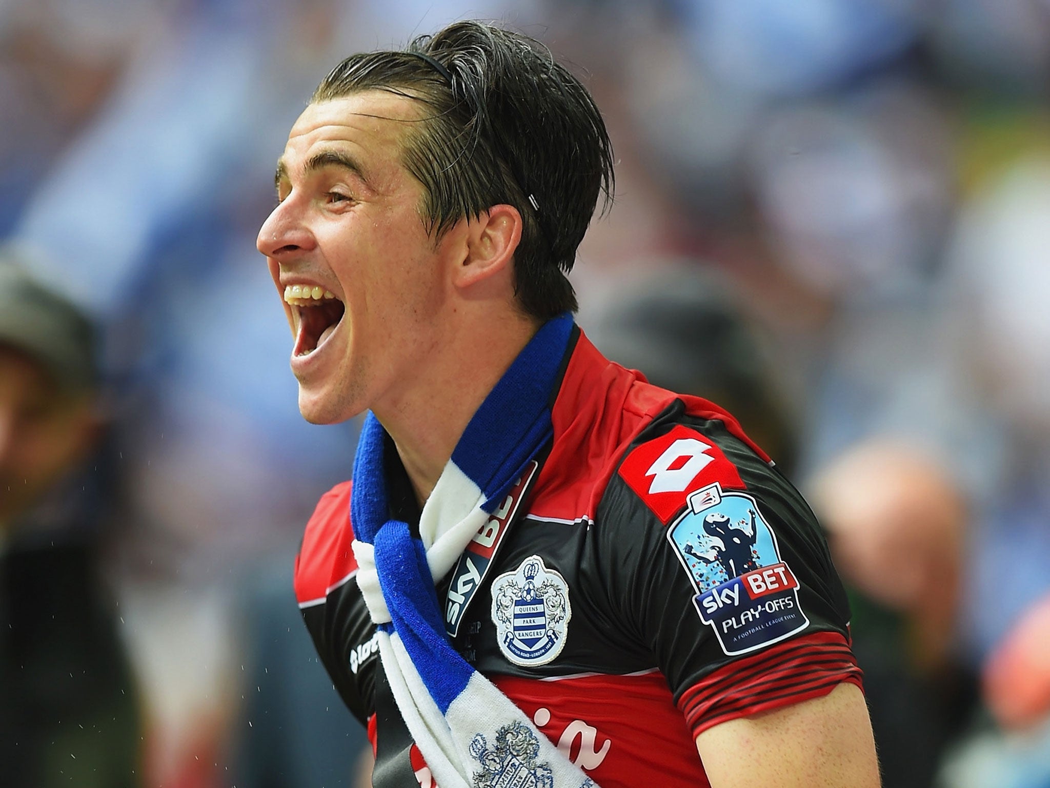 Joey Barton celebrates QPR's promotion to the Premier League on Saturday
