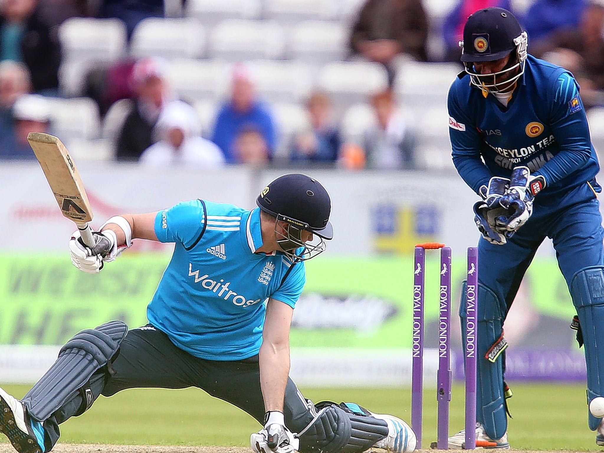 James Anderson is bowled by Sachithra Senanayake and England are all out for 99