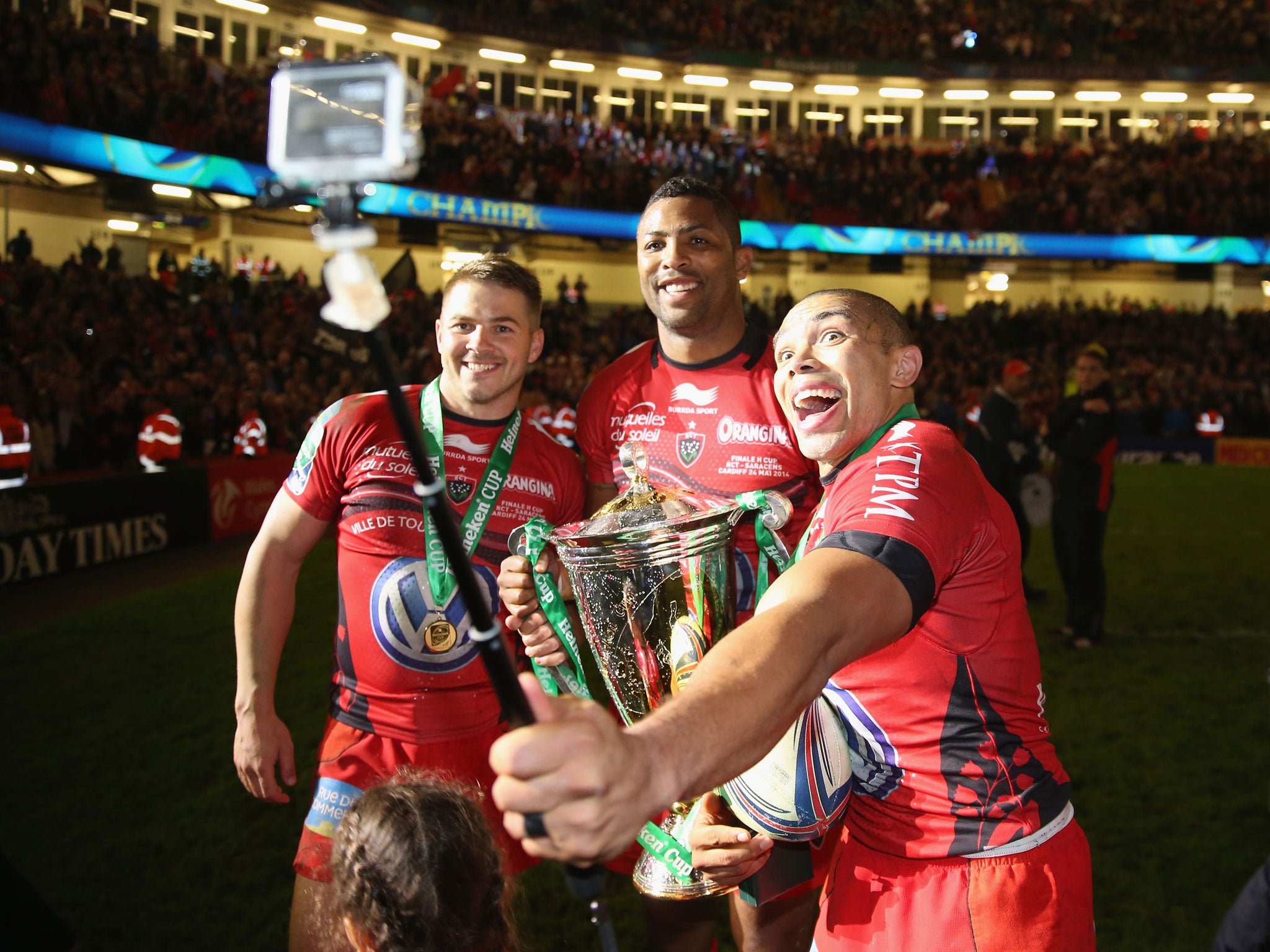 Bryan Habana, right, of Toulon, takes a selfie with team-mates Delon Armitage, centre, and Drew Mitchell after winning the Heineken Cup