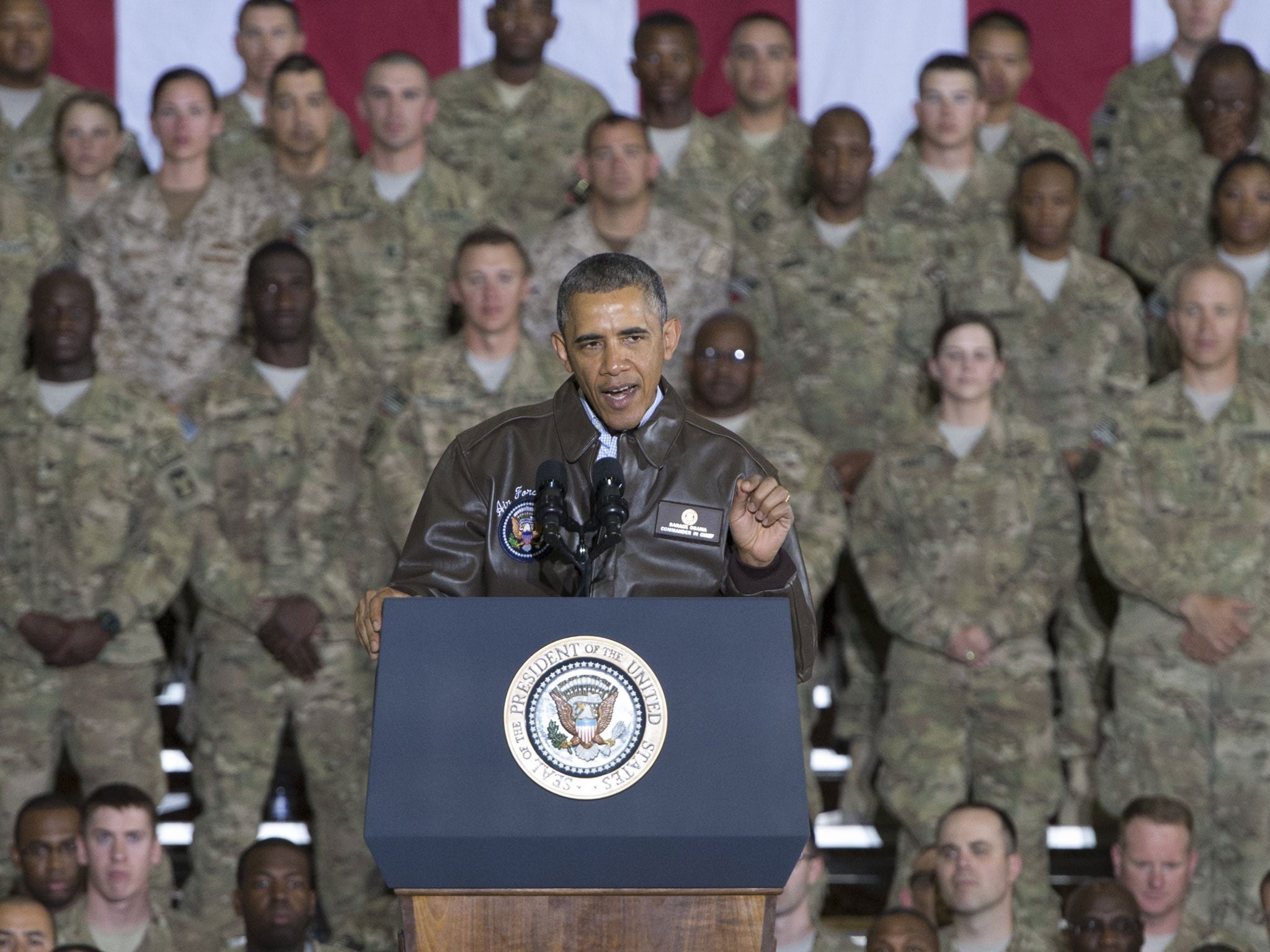 US President Barack Obama addresses US troops during a surprise visit to Bagram Air Field, north of Kabul, in Afghanistan