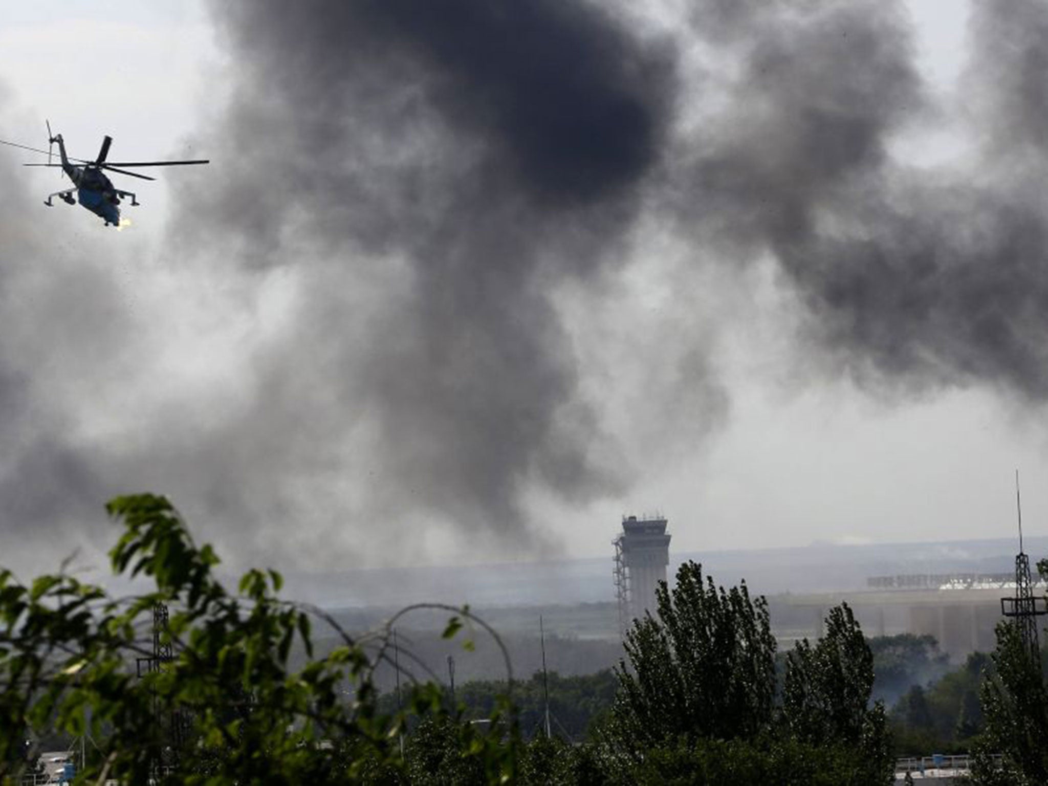 Ukrainian helicopter gunships opened fire against the rebel-held international airport terminal at Donetsk