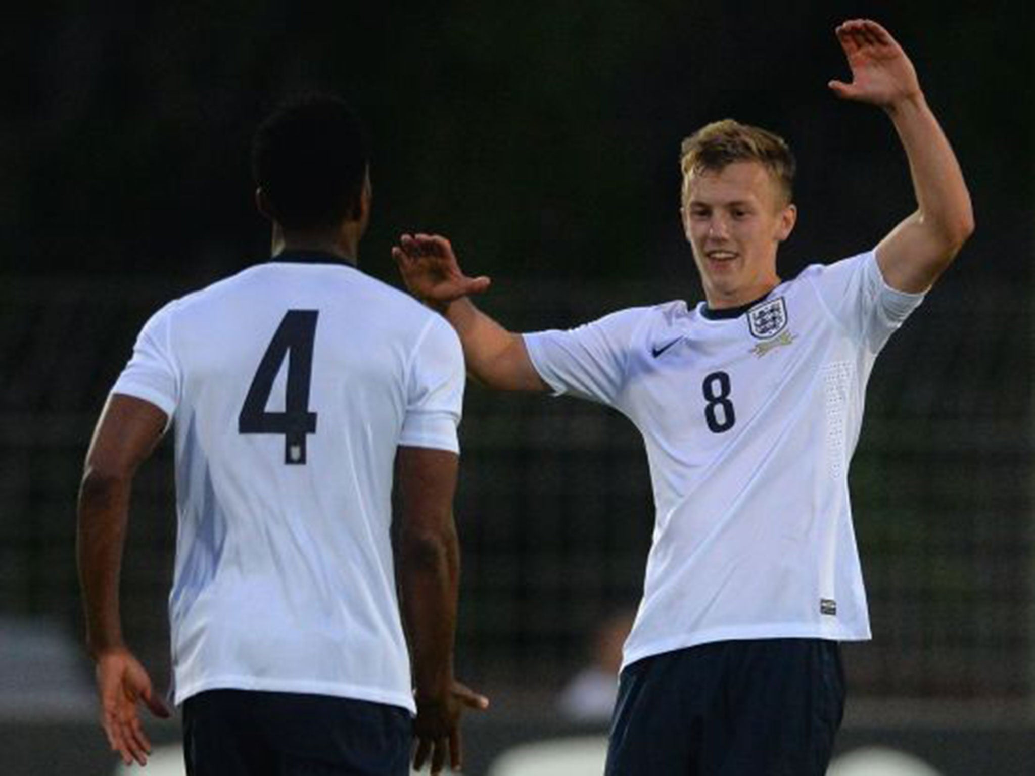 Nathaniel Chalobah celebrates with James Ward-Prowse, right