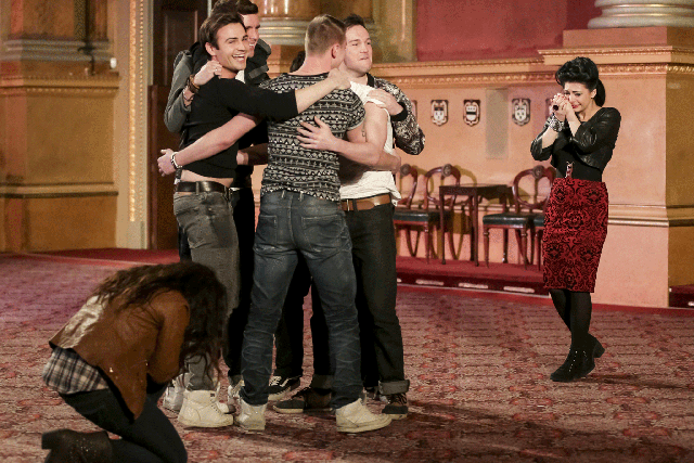 Collabro hug after making it through the final of Britain's Got Talent 2014