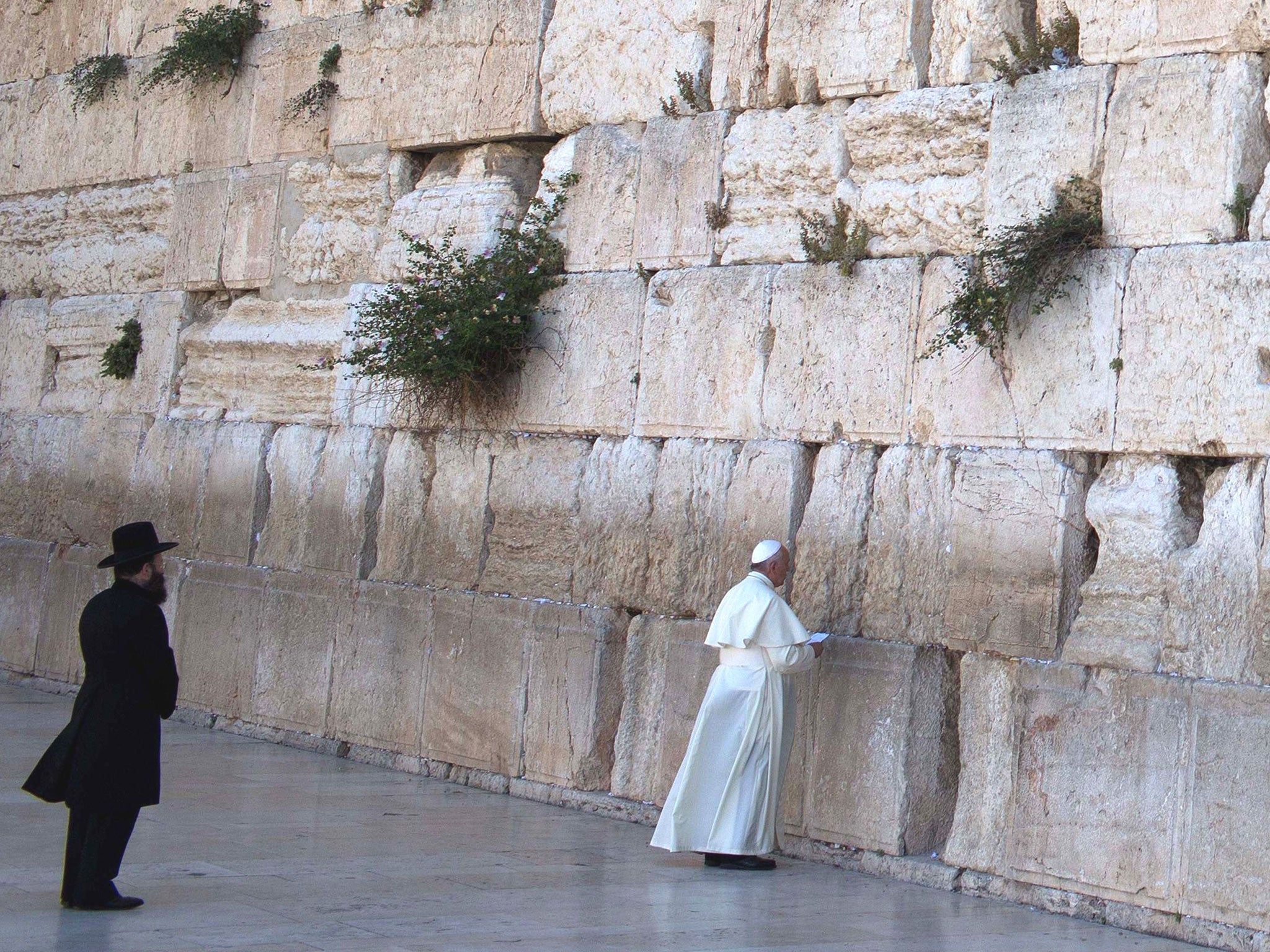 Pope Francis prays at the Western Wall in Jerusalem's Old City