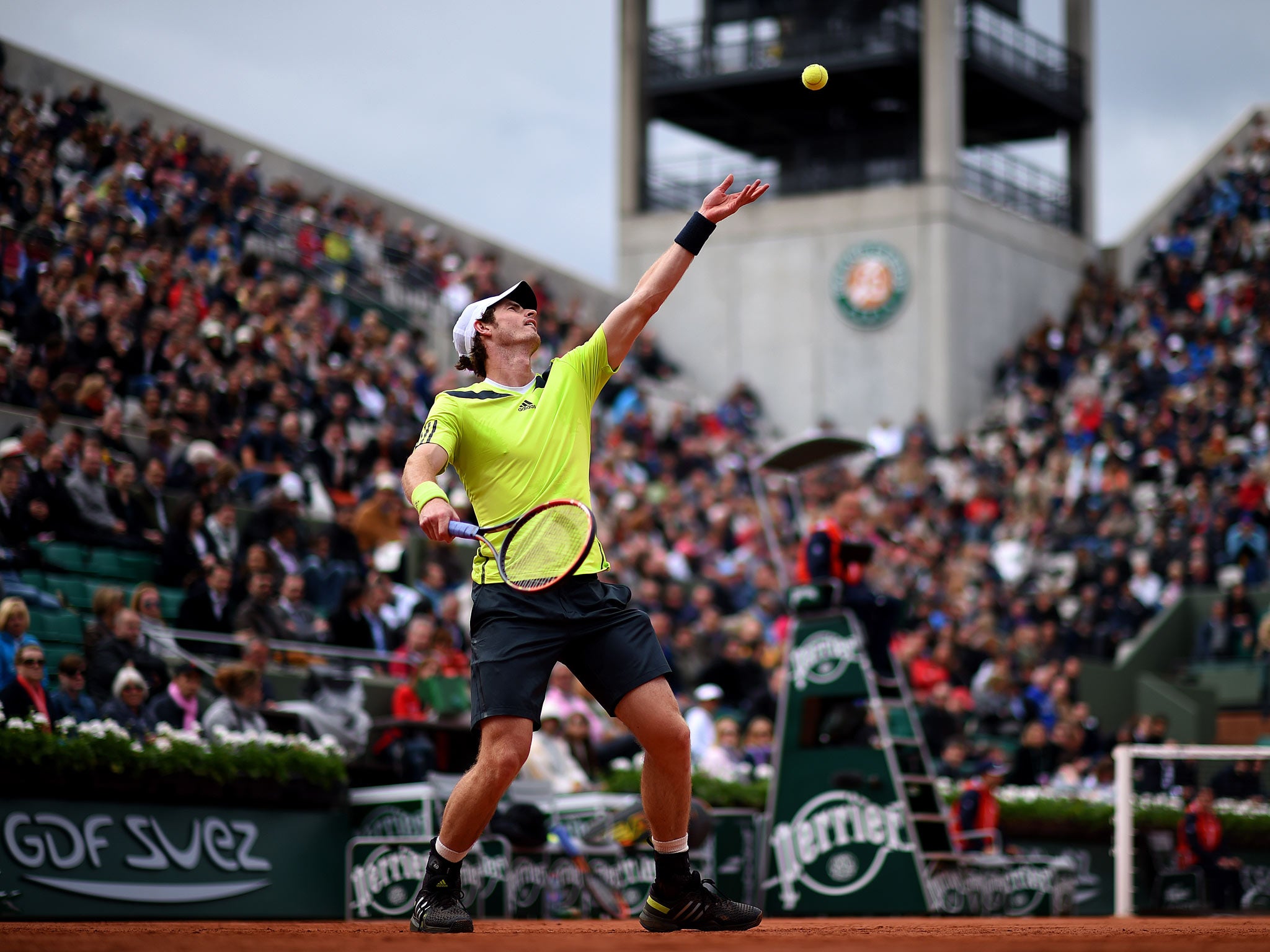 Andy Murray of Great Britain serves during his men's singles match against Andrey Golubev of Kazakhstan on day three of the French Open at Roland Garros