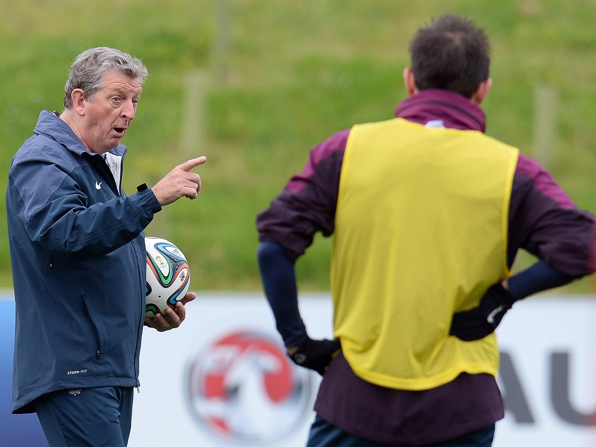 Roy Hodgson makes a point to Frank Lampard