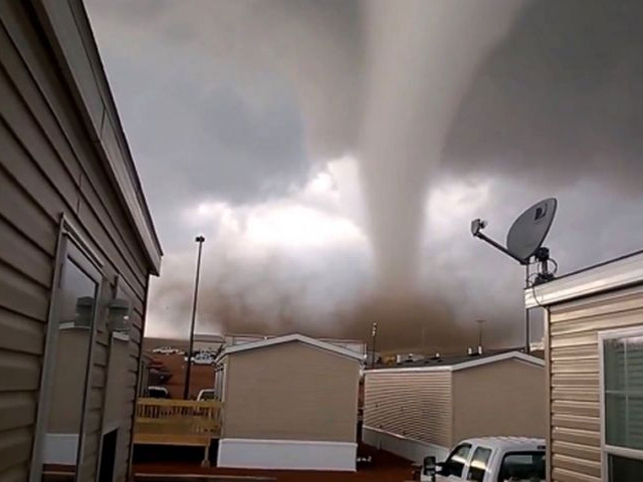 A still from a video provided by Dan Yorgason shows a tornado in a worker's camp near Watford City, N.D., in the heart of the state's booming oil patch. The tornado injured nine people, including a 15-year-old girl who suffered critical injuries, and dama