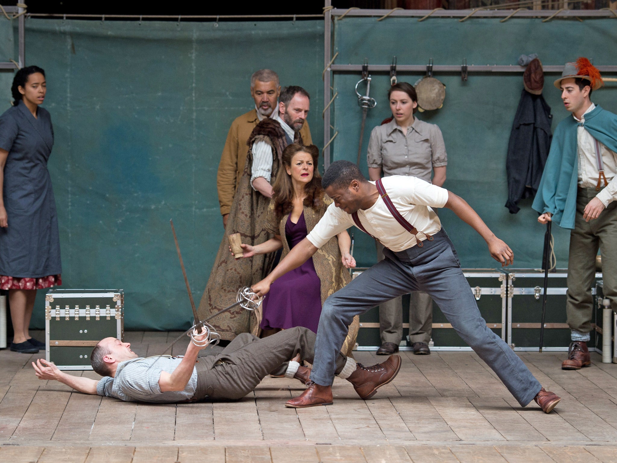 Members of the cast of a new touring production of William Shakespeare's 'Hamlet' perform at the Globe theatre in London