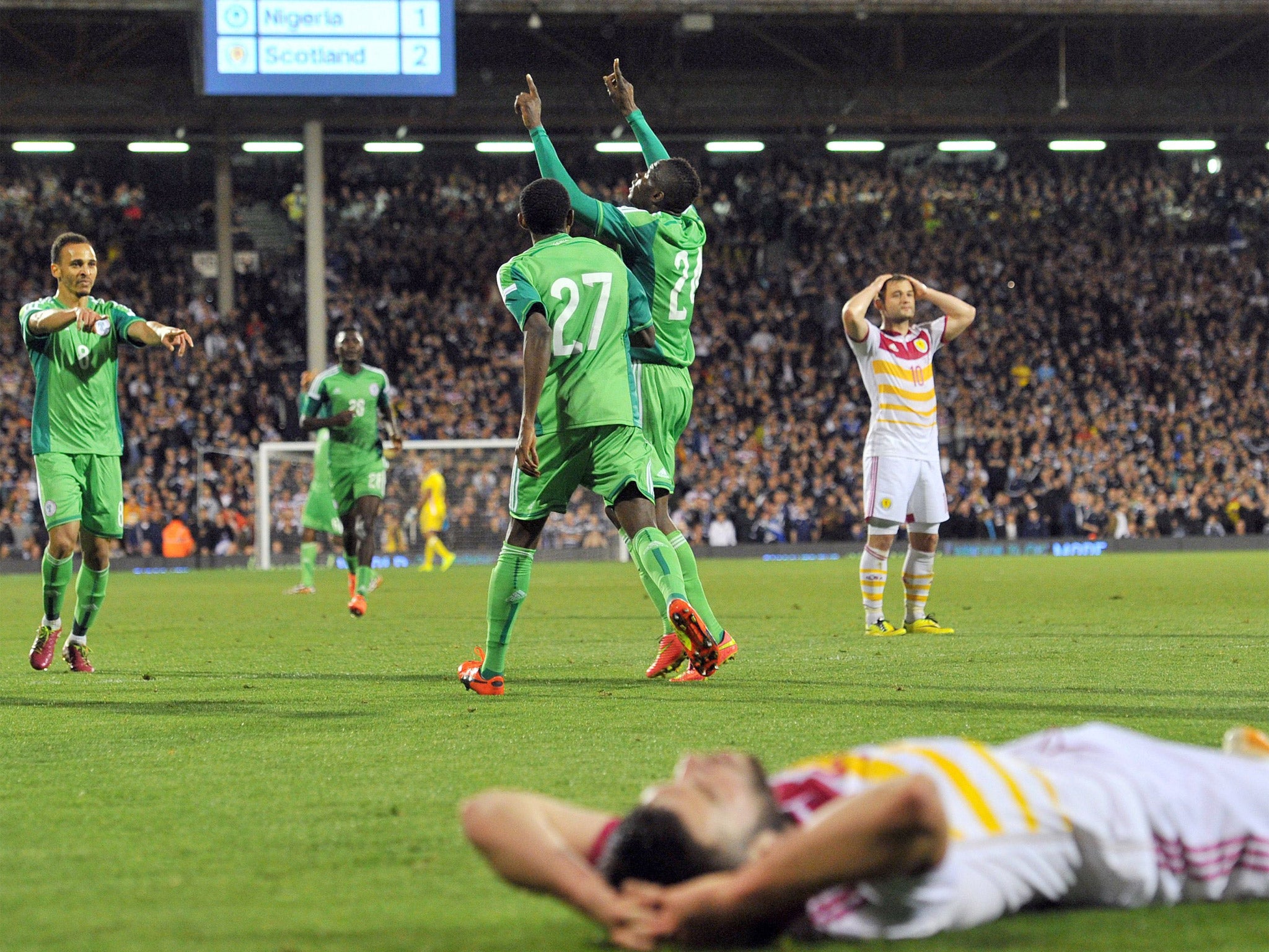 Nigeria striker Uche Nwofor celebrates scoring his team's second goal