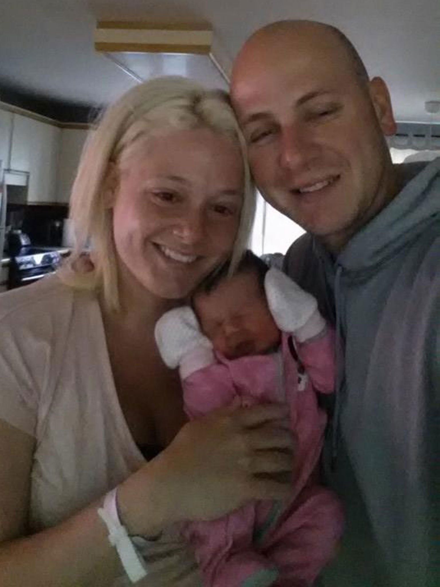 Melissa McMahon after being reunited with her new born baby Victoria