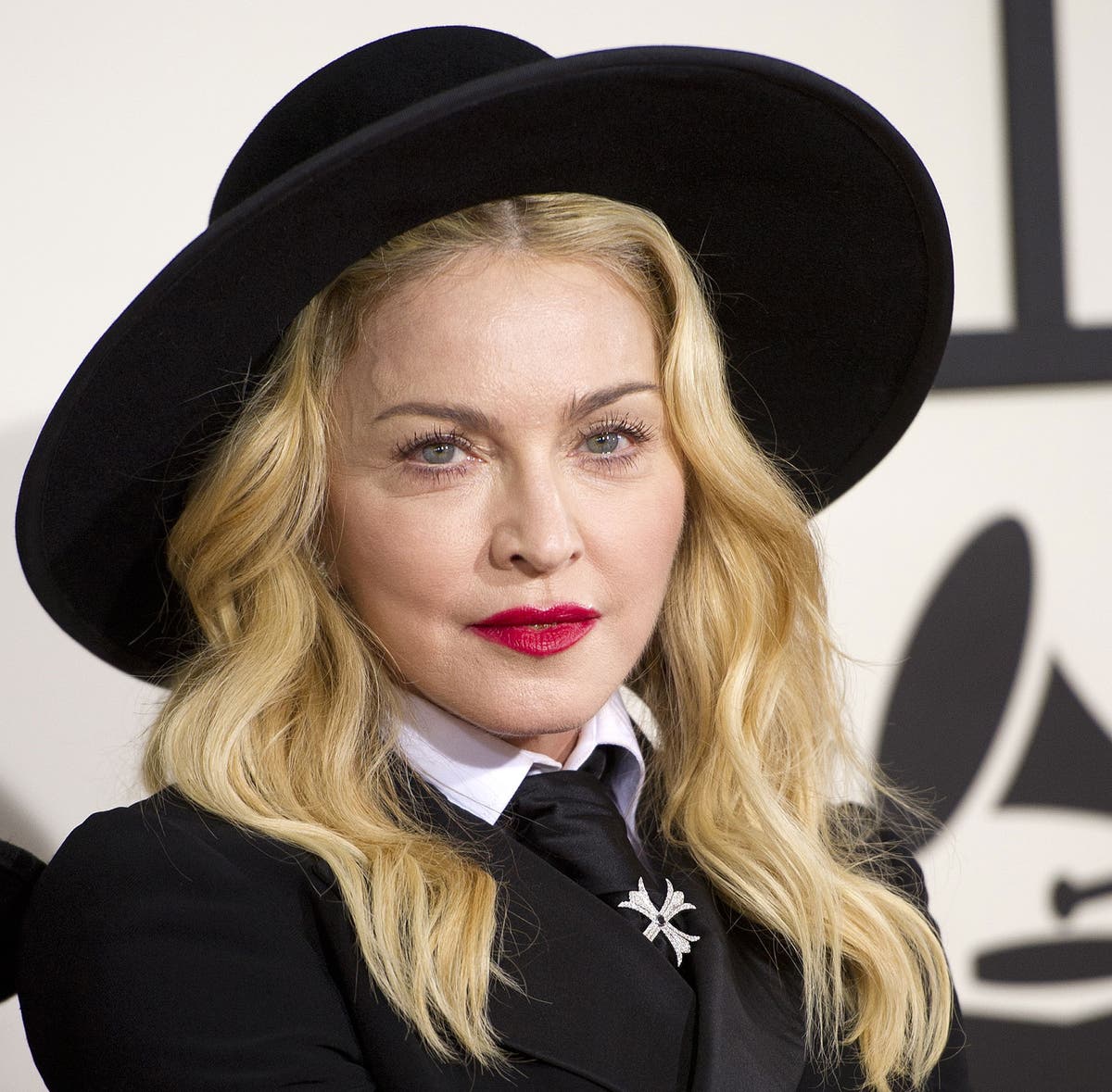 Madonna misses jury duty due to sickness, then enjoys beach holiday ...