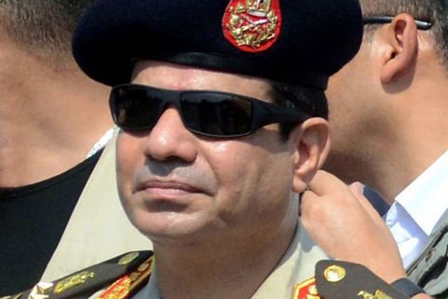 Abdel Fattah al-Sisi attending the funeral of Giza security chief Nabil Farrag in 2013