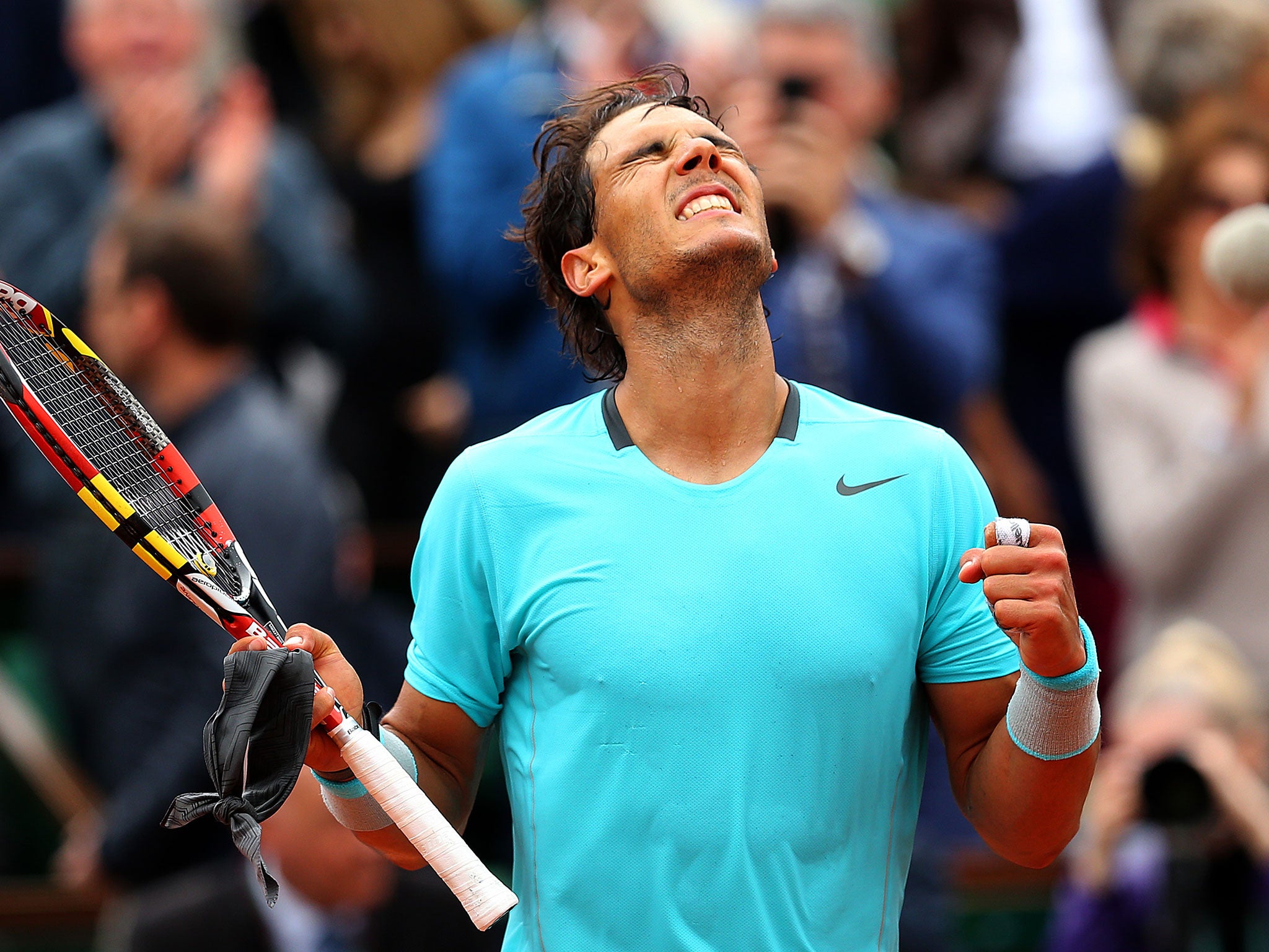 Rafael Nadal of Spain celebrates victory in his men's singles match against Dominic Thiem of Austria