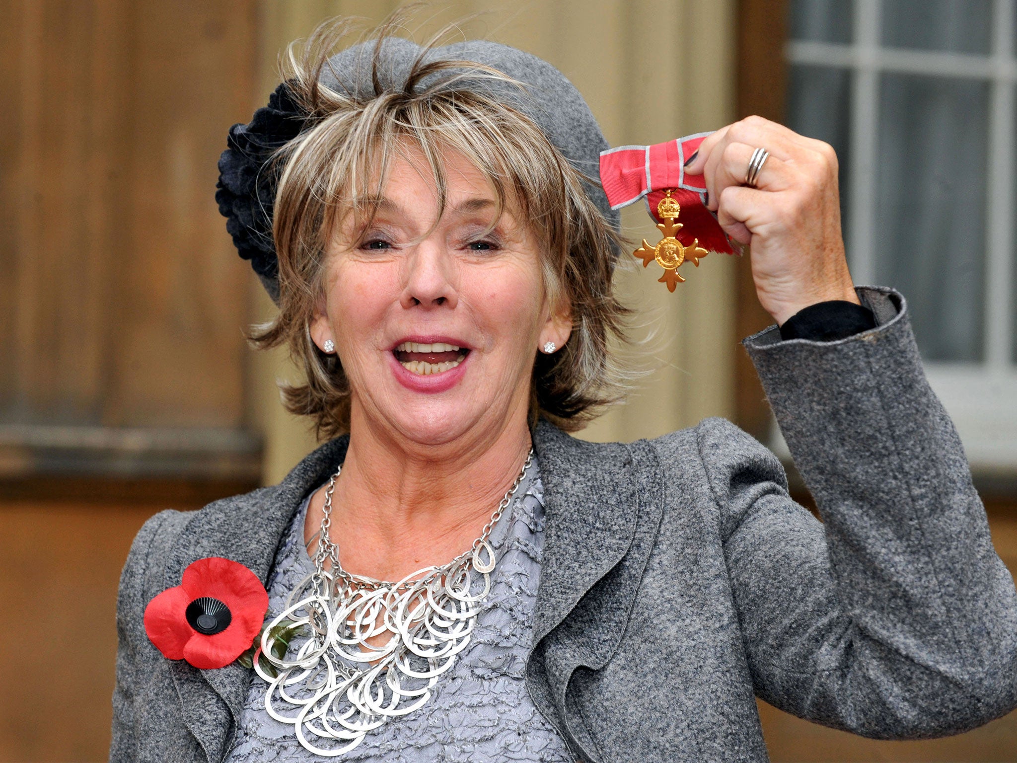 Sue Johnston, pictured with her OBE