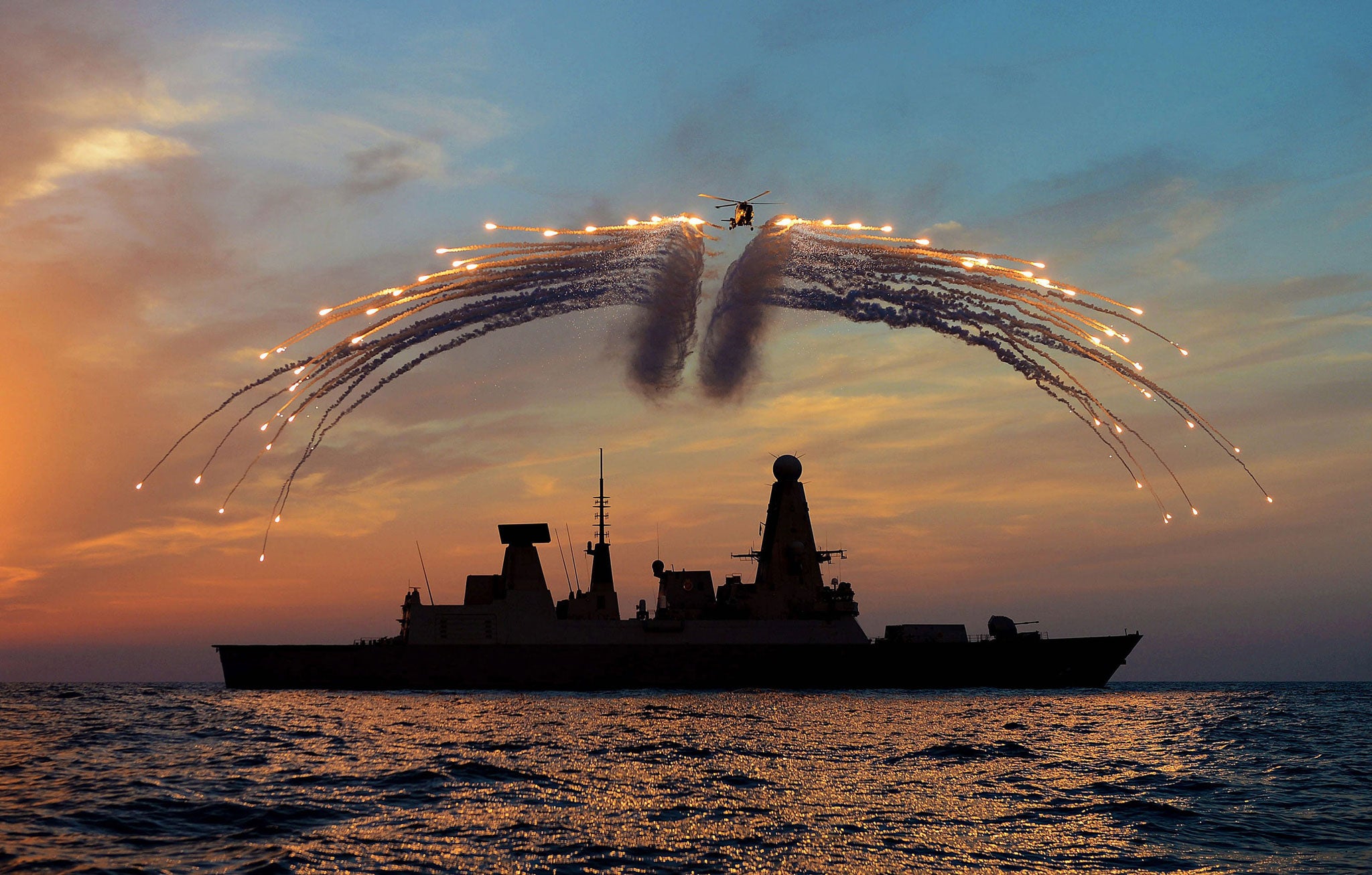 HMS Dragonís Mk8 Lynx Helicopter conducted day into night flying serial by L(Phot) Dave Jenkins which won the Media Operations Category which was awarded to the best single image that is judged to create the most impact as a news in the annual Peregrine T