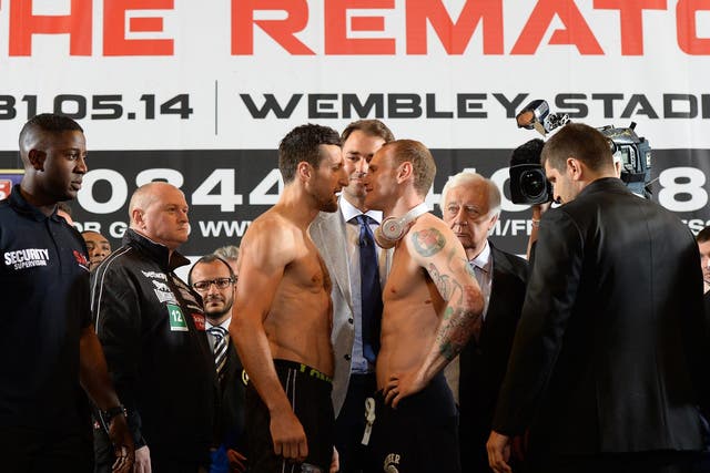 Carl Froch (left) and George Groves at  the weigh-in for tonight’s Wembley fight 