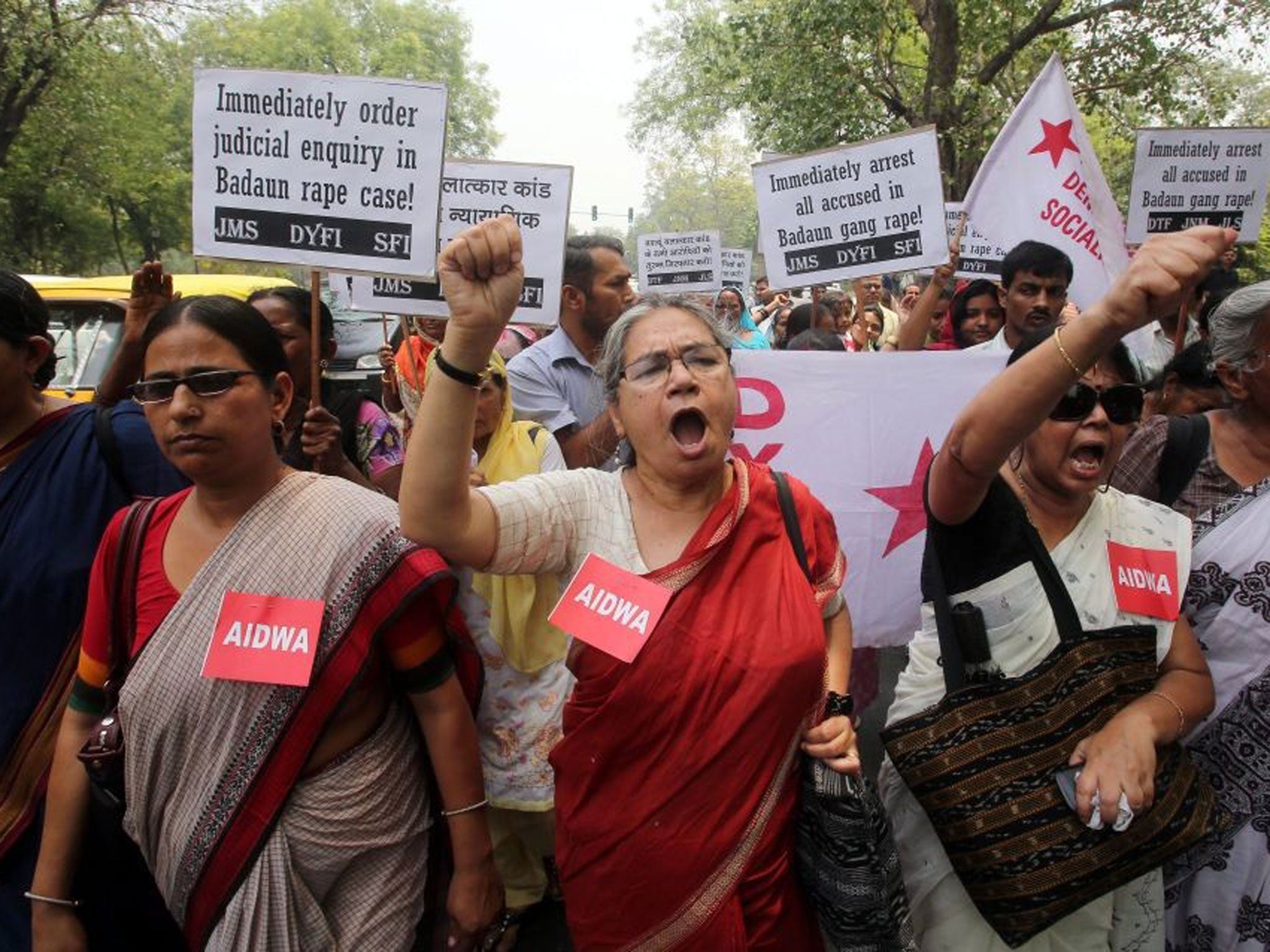 Demonstrators protest against the Uttar Pradesh government in New Delhi on 31 May