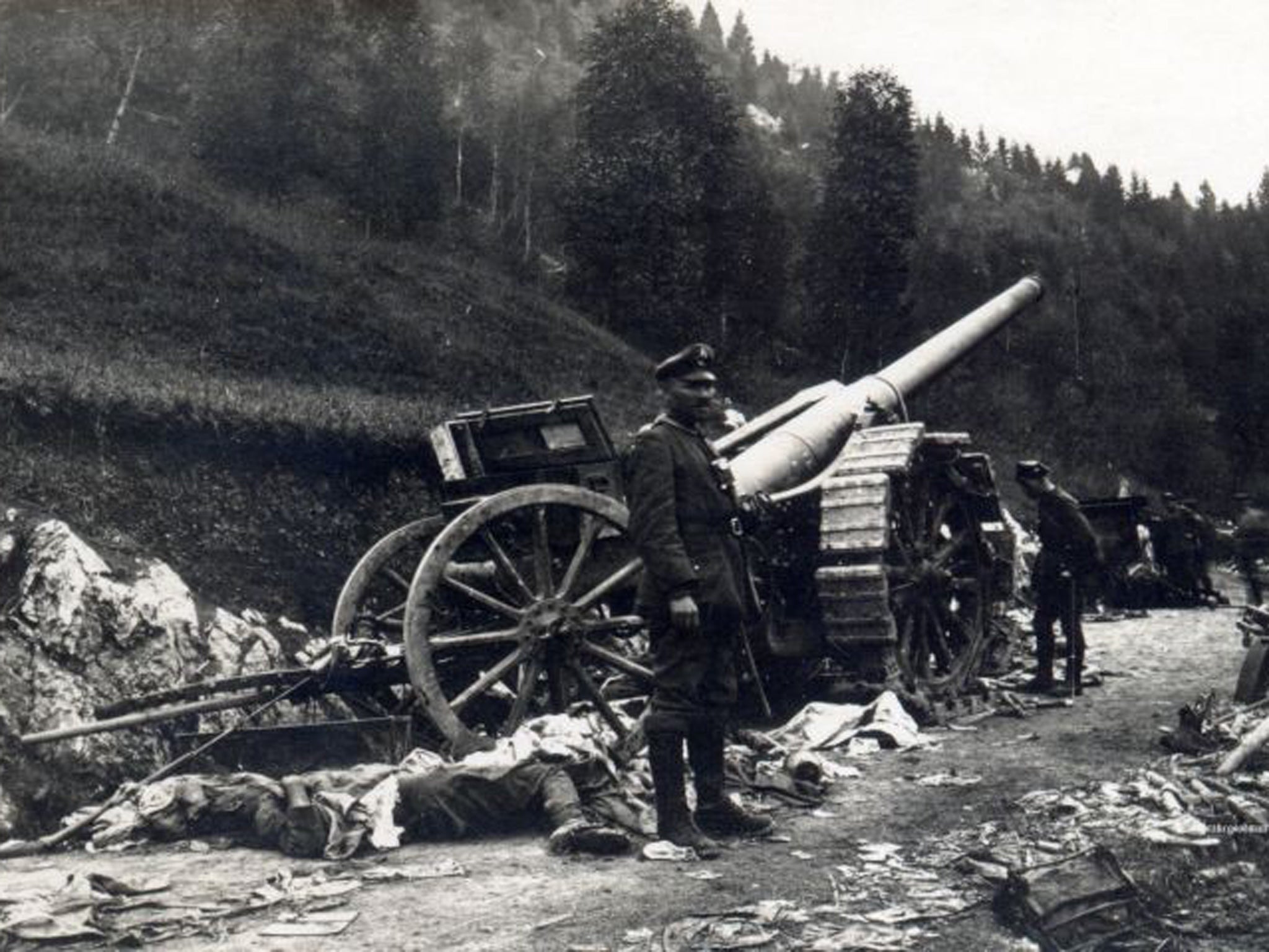 Carnage on the road to Romania’s Turnu Rosu Pass. A German NCO stands beside an Italian-made cannon and the body of what may have been a gun crew member