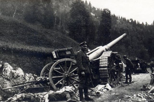 Carnage on the road to Romania’s Turnu Rosu Pass. A German NCO stands beside an Italian-made cannon and the body of what may have been a gun crew member