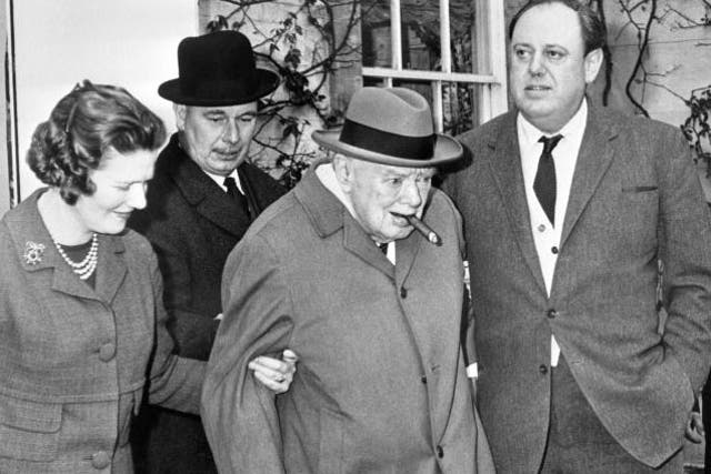 Sir Winston Churchill with his daughter Mary and son-in-law Christopher Soames (right) in  1964.
