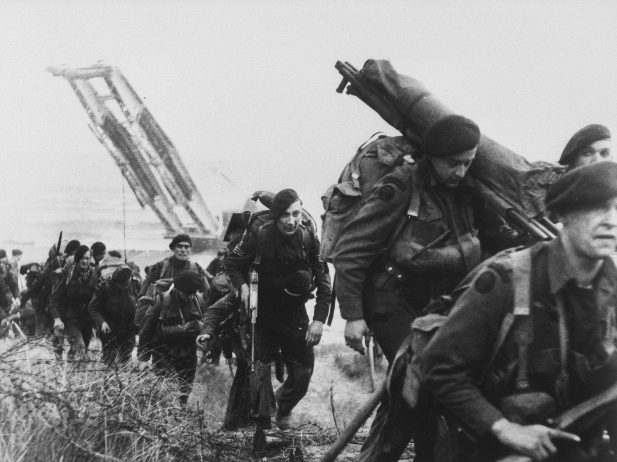 Royal Marine Commandos moving off the Normandy Beaches during the advance inland from "Sword" beach on 6 June 1944