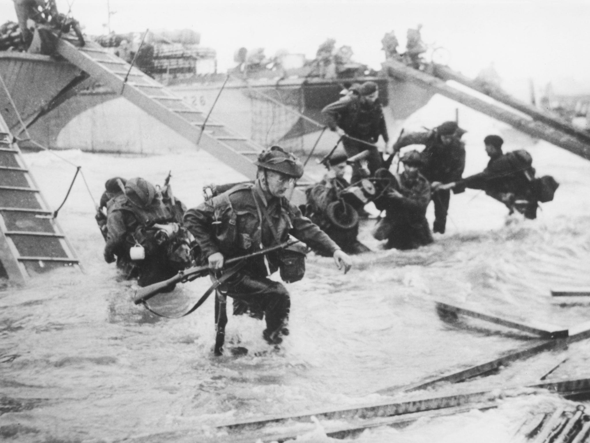 Troops from the 48th Royal Marines at Saint-Aubin-sur-mer on Juno Beach, Normandy, France, during the D-Day landings, 1944