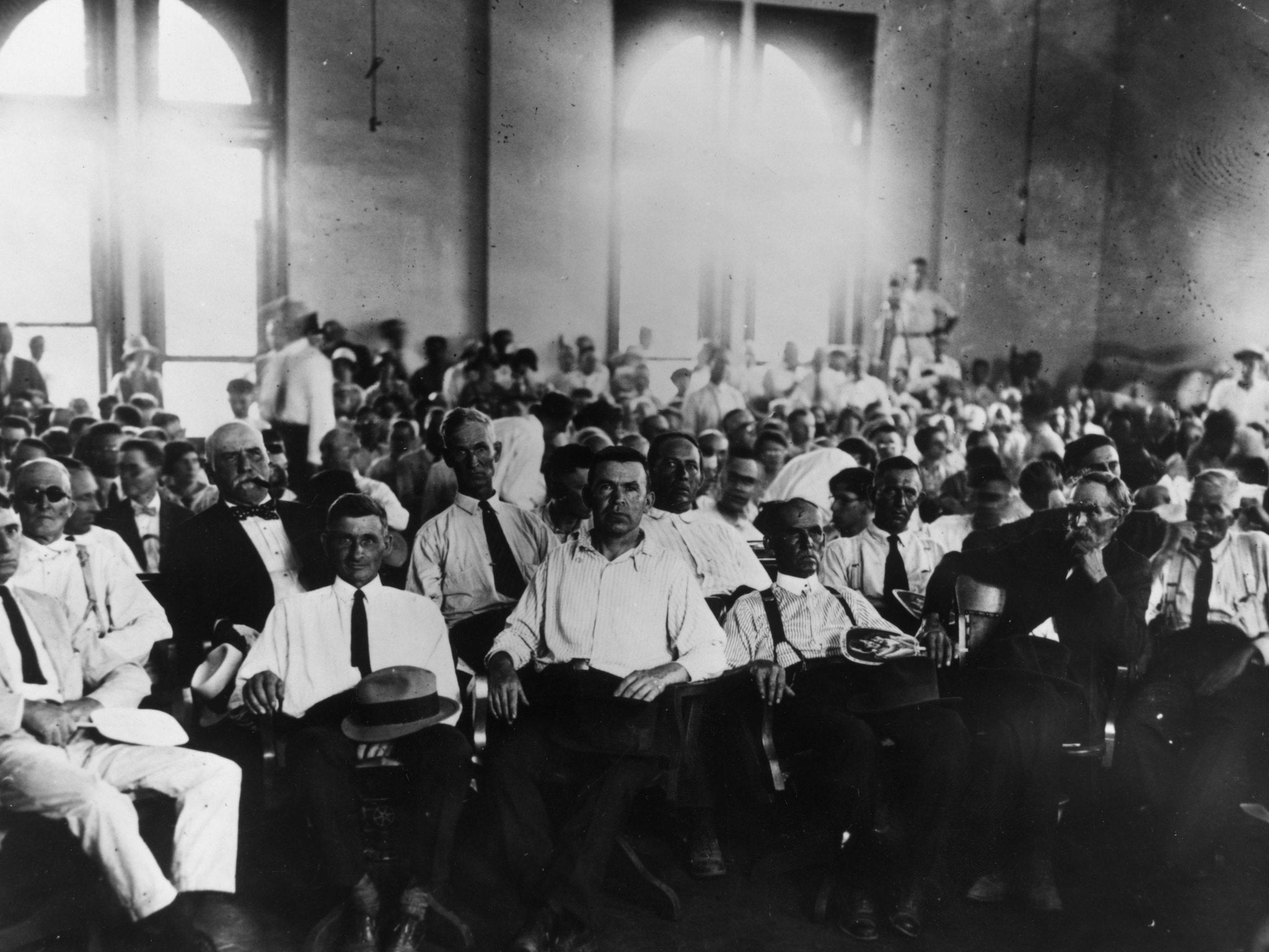 Crowds at the Scopes trial in 1925 where a teacher was prosecuted for teaching evolution in Tennessee.