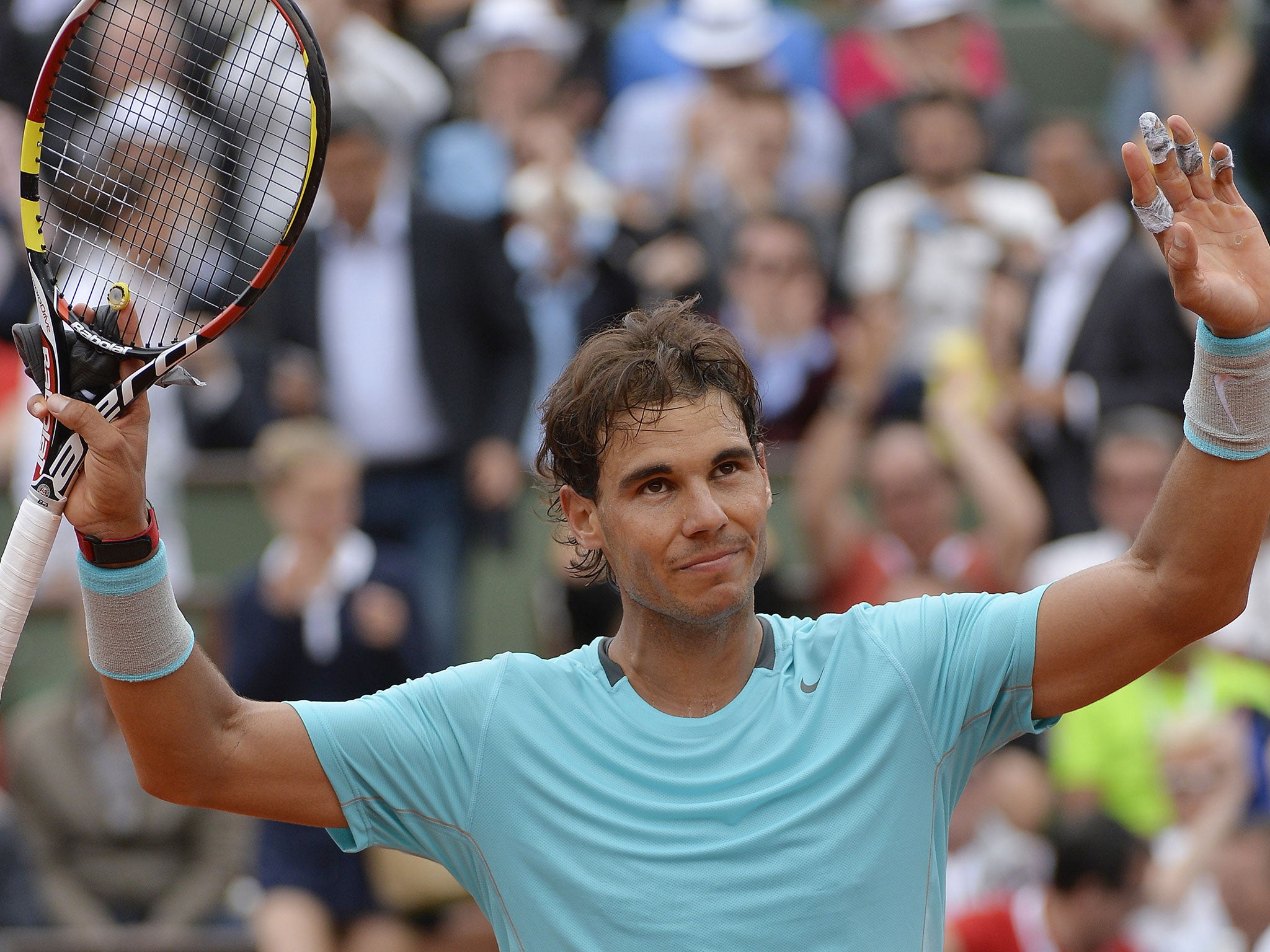 Spain's Rafael Nadal celebrates after winning his French tennis Open round of sixteen match against Serbia's Dusan Lajovic at the Roland Garros stadium in Paris