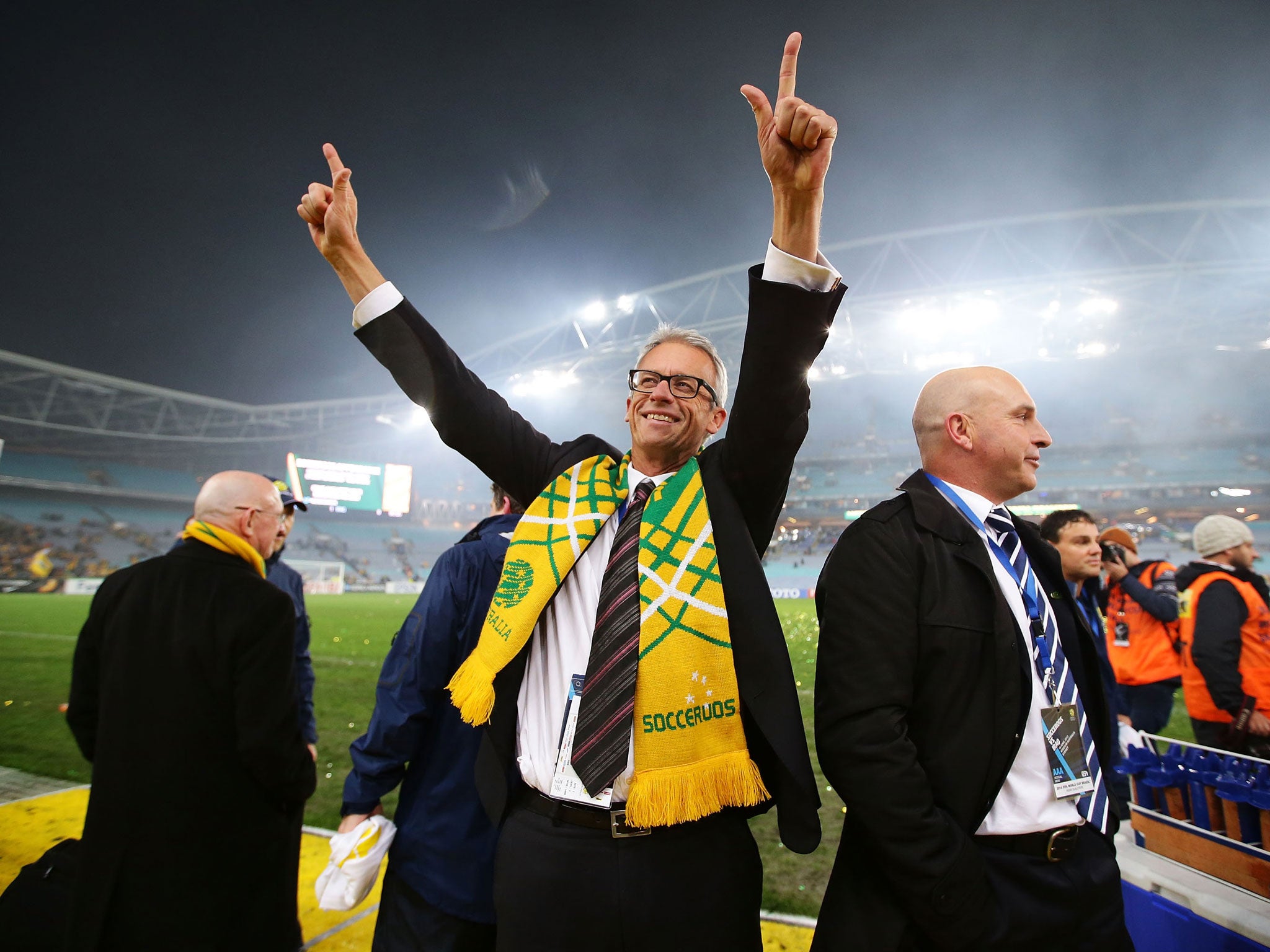 File: The FFA's David Gallop celebrates and waves to fans after the Socceroos victory during the FIFA 2014 World Cup Asian Qualifier on 18 June, 2013