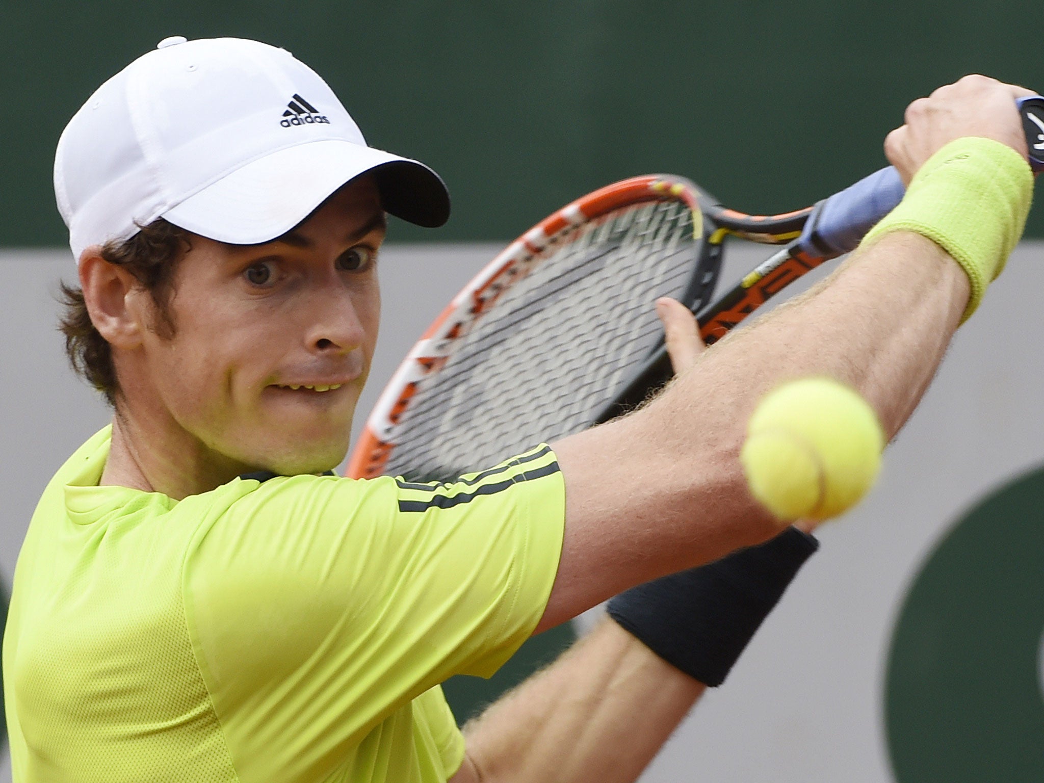 Andy Murray replies with a backhand during his win over Fernando Verdasco at the French Open