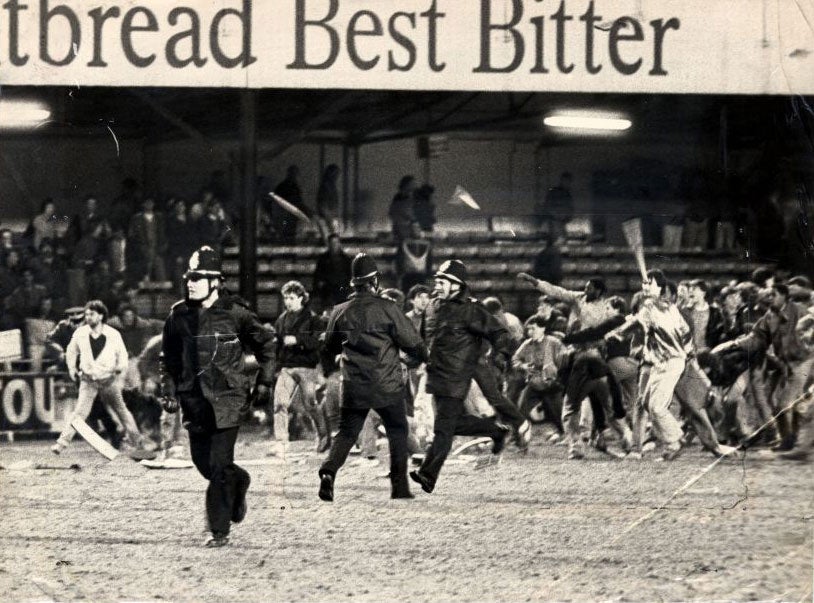 Fans rioting on the pitch during the Luton vs Millwall FA Cup 1/4 final in 1985