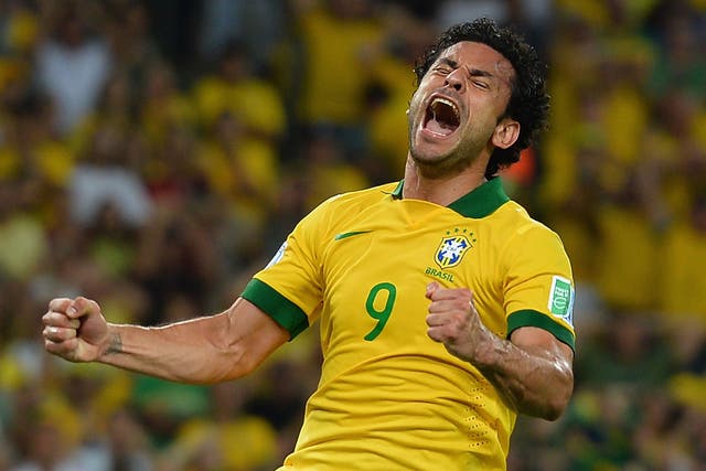 Fred celebrates scoring one of his two goals in Brazil’s  3-0 win over Spain  last year  