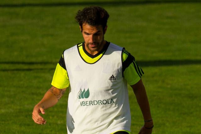 Cesc Fabregas, preparing for the World Cup with Spain, is out of favour at Barça 