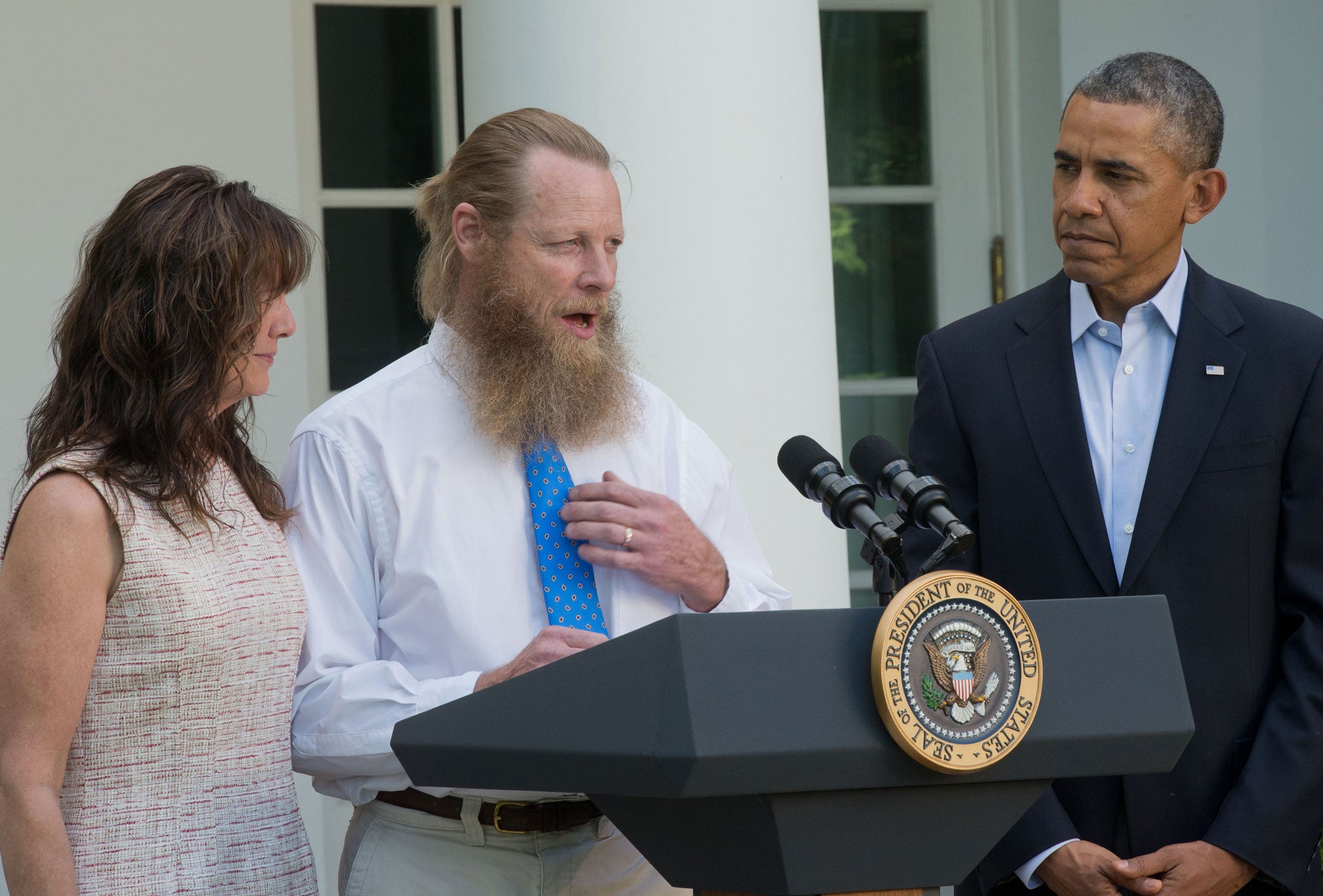 Robert Bergdahl makes a statement about the release of his son Sgt Bowe Bergdahl as his wife, Jani Bergdahl and President Barack Obama listen in the Rose Garden at the White House