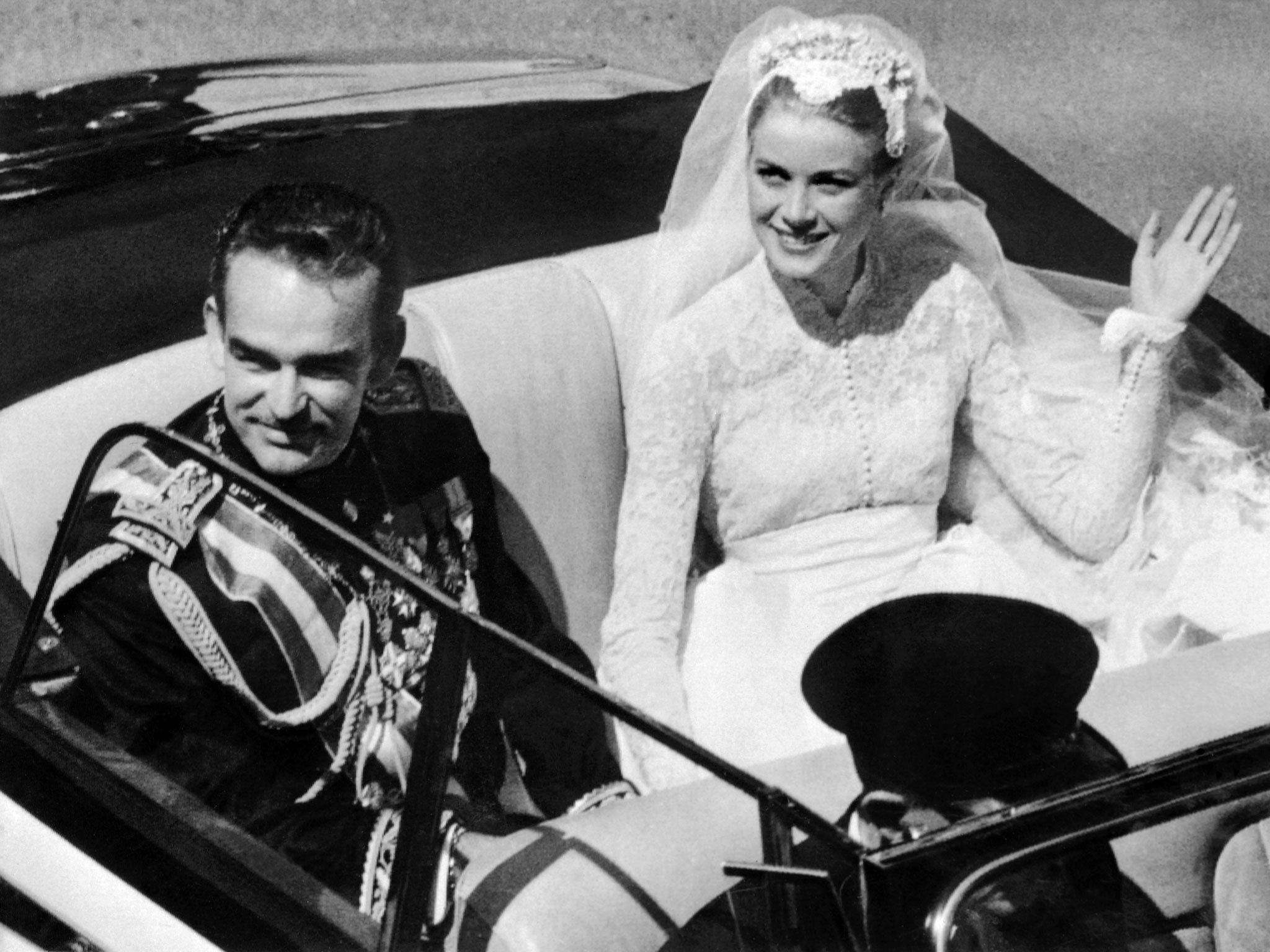 Prince Rainier III of Monaco and US actress and princess of Monaco Grace Kelly on their wedding day in 1956