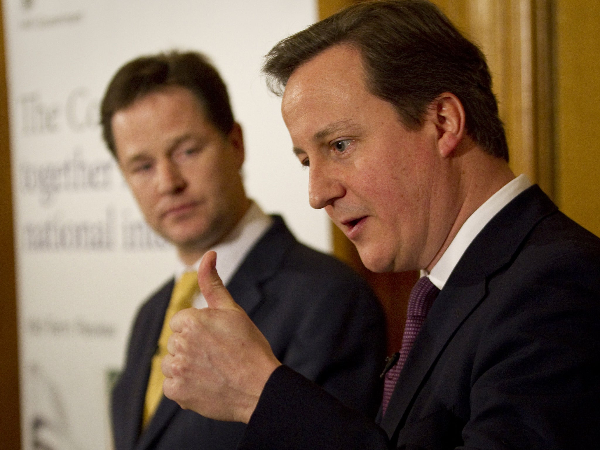 A rare shot of Clegg taking a stand on Cameron's right