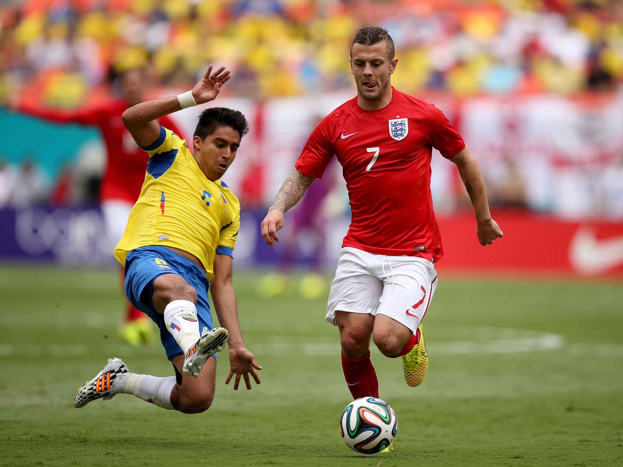 Jack Wilshere evades a tackle during the friendly match between England and Ecuador on June 4, 2014 in Miami Gardens.