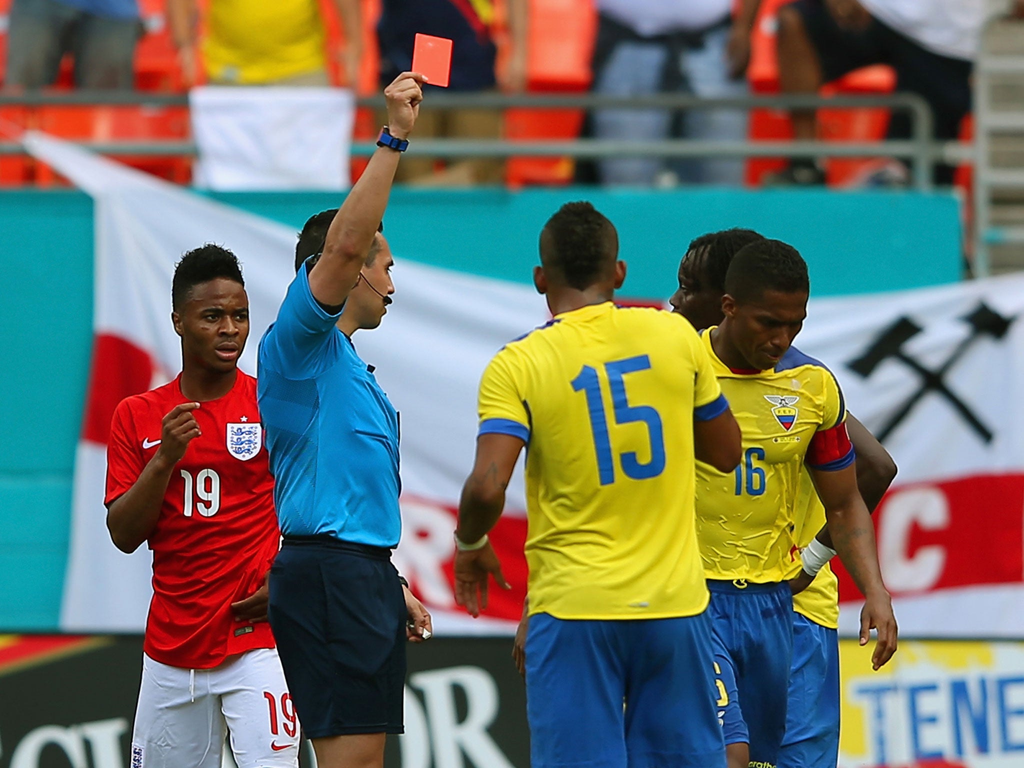 Antonio Valencia is shown a red card for his reaction to Raheem Sterling's (L) tackle, who was also sent off in the 2-2 draw between England and Ecuador