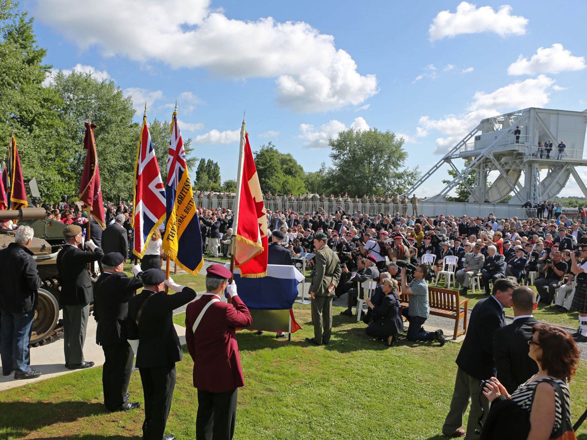 A remembrance ceremony is held at Pegasus Bridge memorial in Benouville western France, Thursday June 5, 2014,