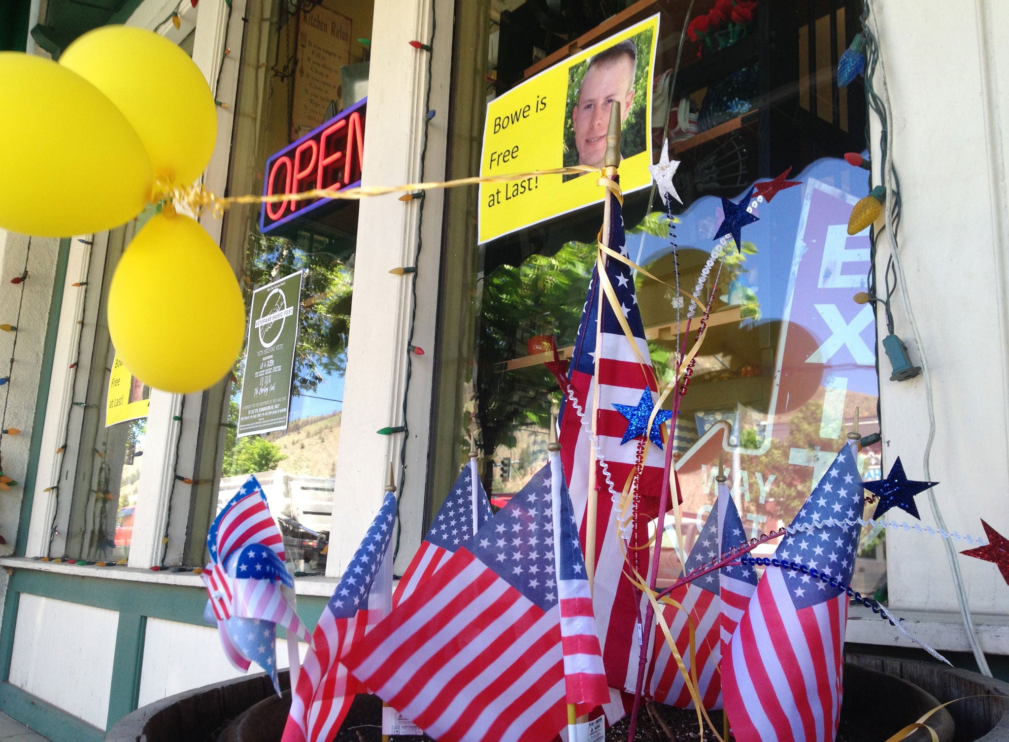 Flags and balloons marking the release from captivity of Sergeant Bowe Bergdahl adorn the sidewalk outside a shop in the soldier's hometown of Hailey, Idaho, Wednesday, June 4, 2014