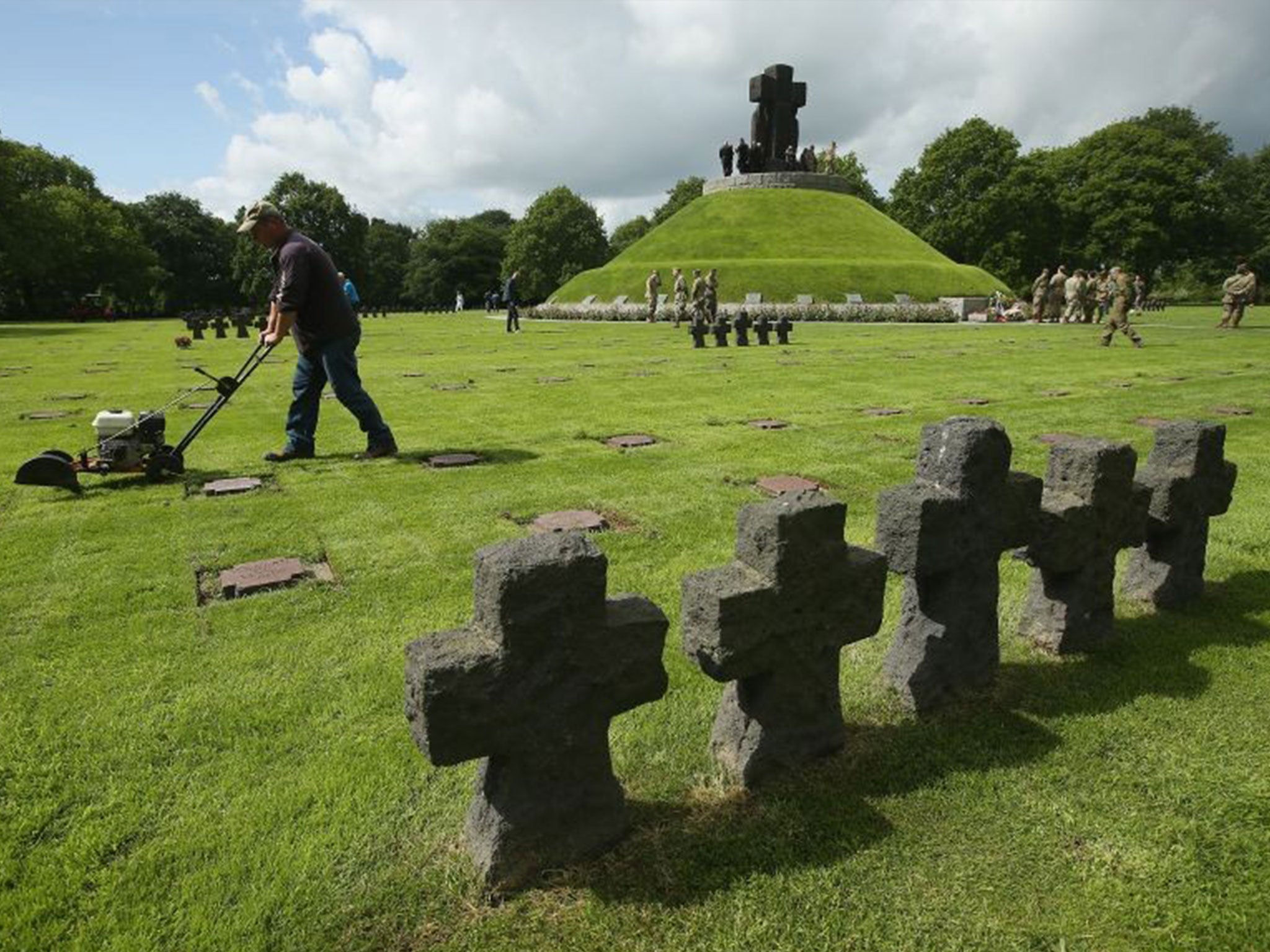 Gravestones at the German Cemetery where approximately 21,000 German World War II soldiers are buried at La Cambe, France