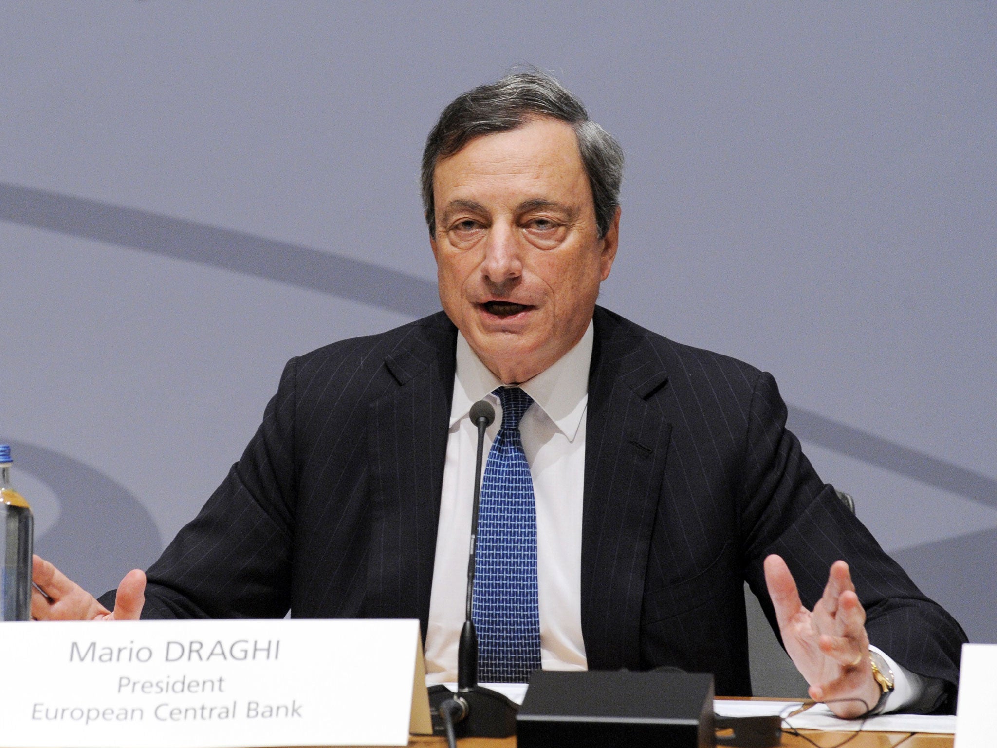 European Central Bank president (ECB) Mario Draghi gives a press conference following ECB's governing council