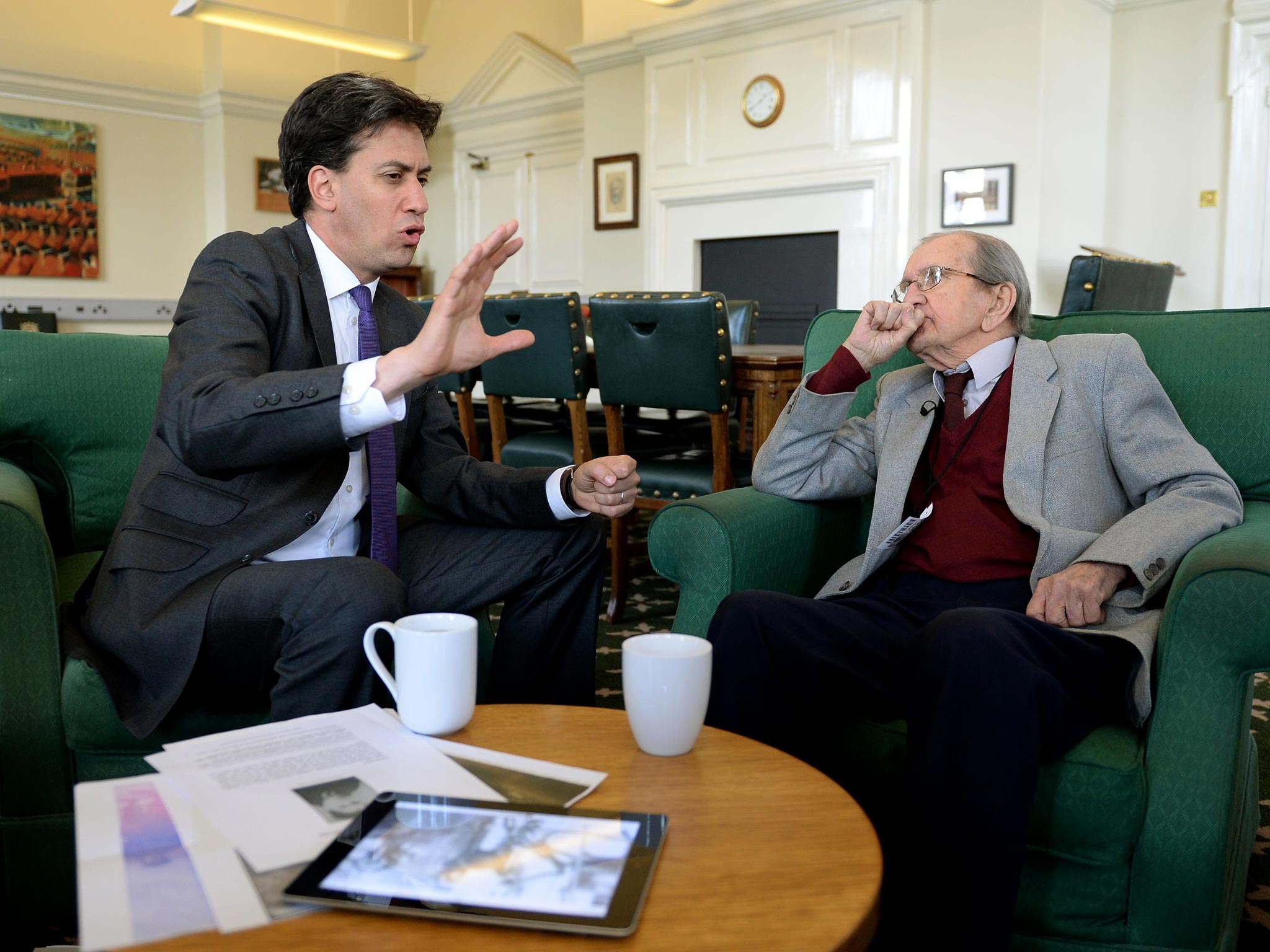 Labour leader Ed Miliband meets D-Day Veteran Mark Radley, 89, who served with his father Ralph on HMS Hilary during the Second World War