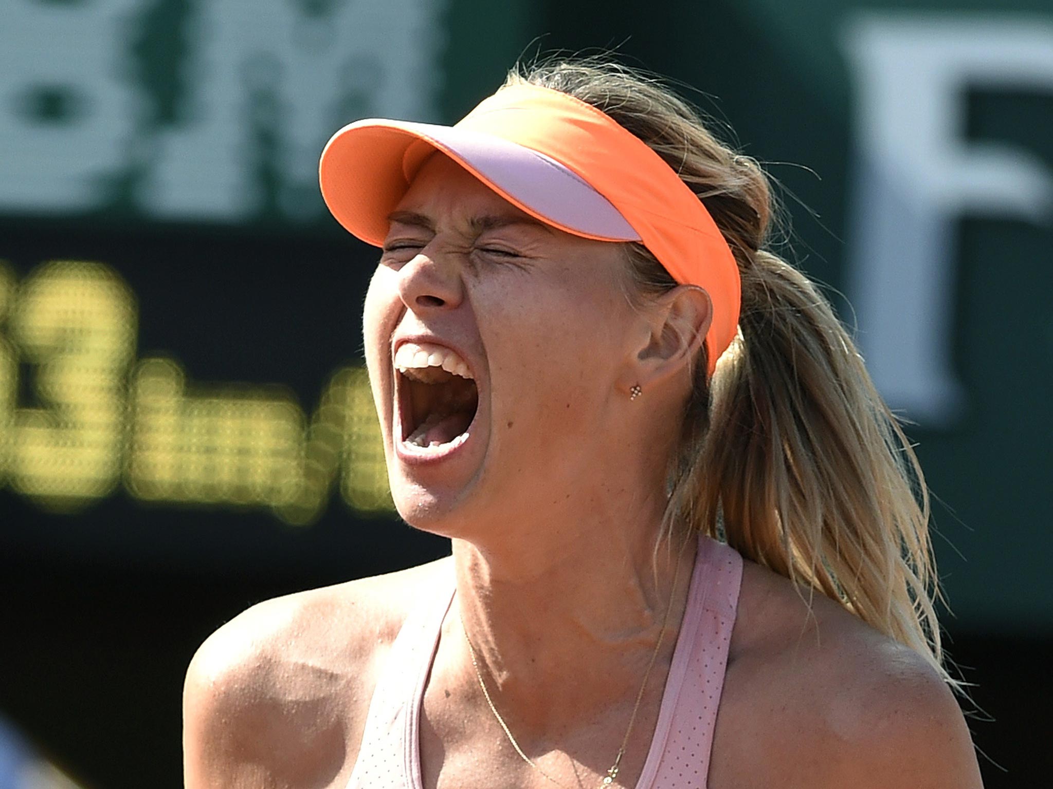Maria Sharapova came back from a set down to beat Eugenie Bouchard yesterday