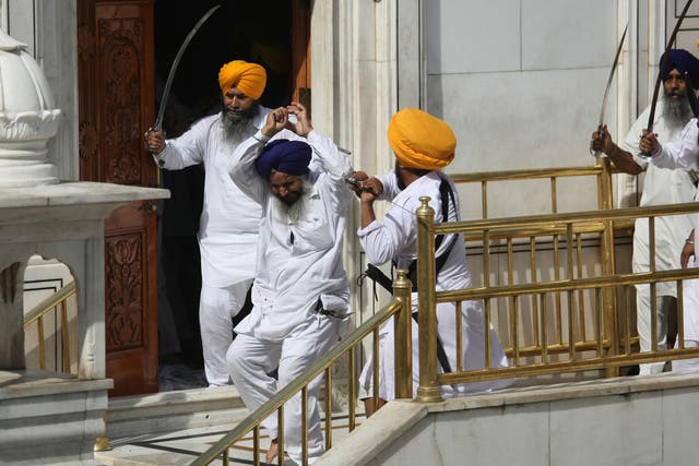 The sword brandishing among the SGPC supporters and Sikh radical group men