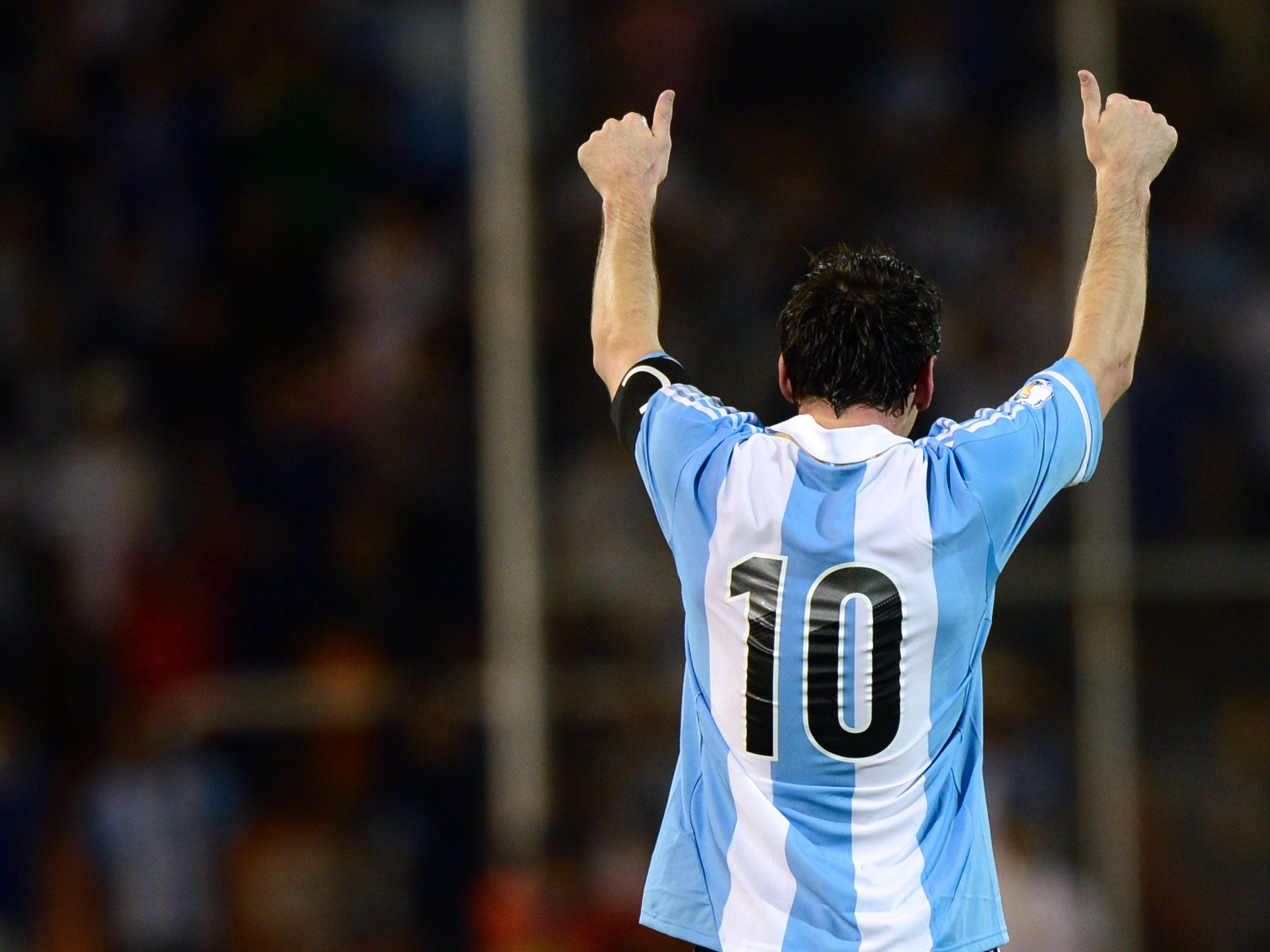 Argentinian forward Lionel Messi celebrates after scoring a goal against Uruguay during a FIFA World Cup Brazil 2014 qualifier match on October 12, 2012.